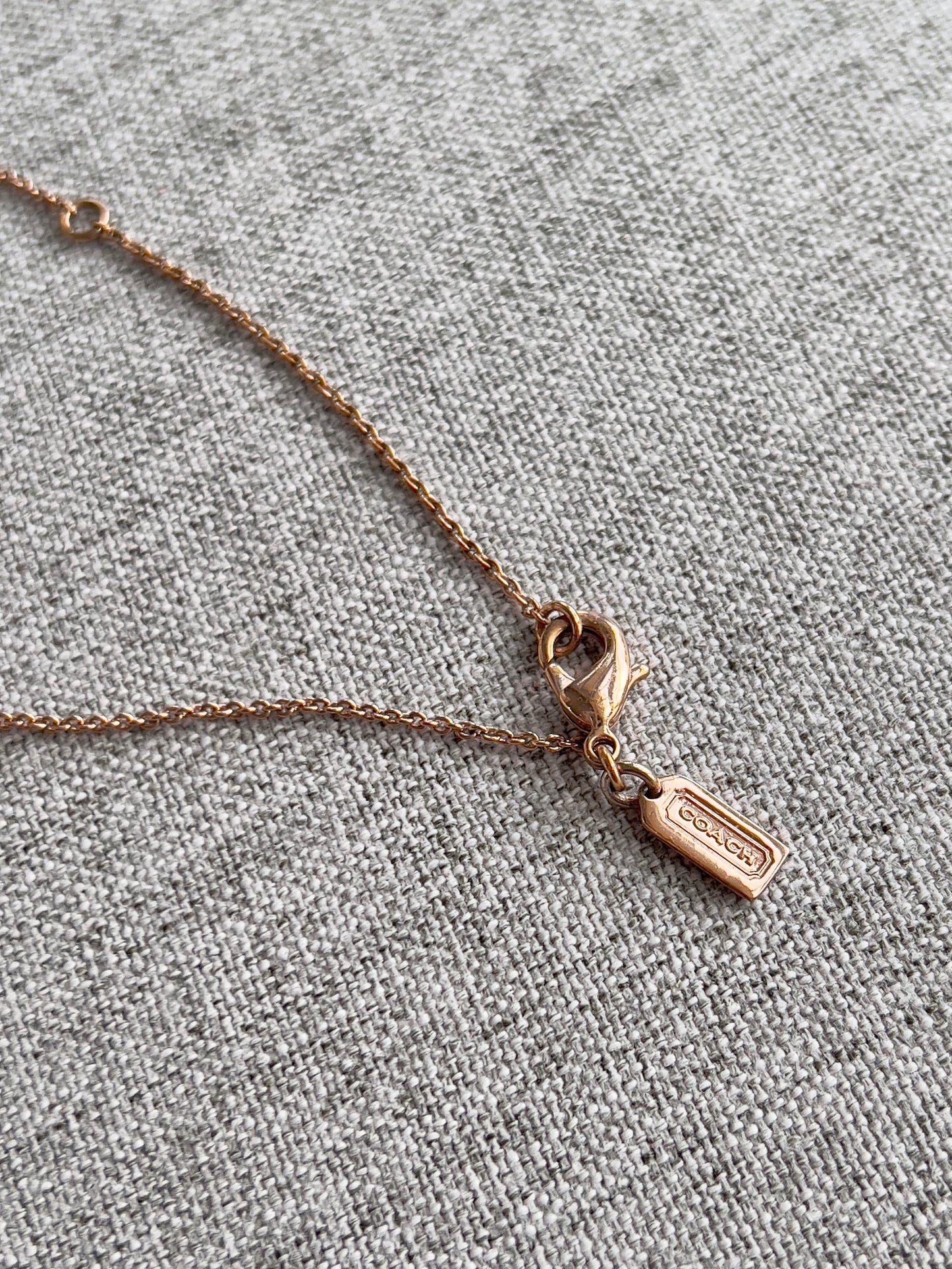 Coach Round Pavé Halo Pendant Rose Gold Tone Necklace