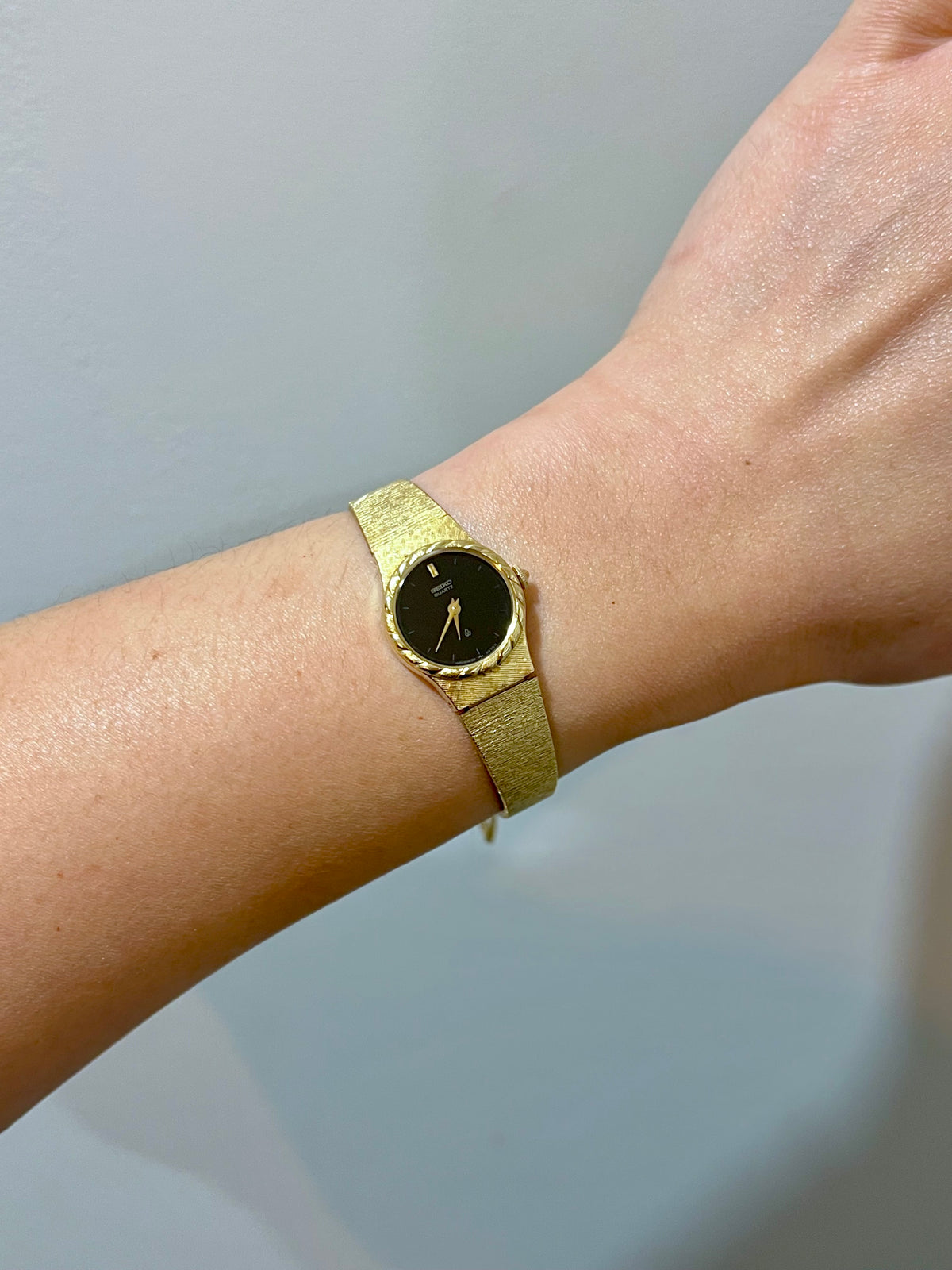 Seiko Rope Bezel Black Dial Bracelet Women's Watch, bracelet detail of a vintage women's watch at Gilded Hour.
