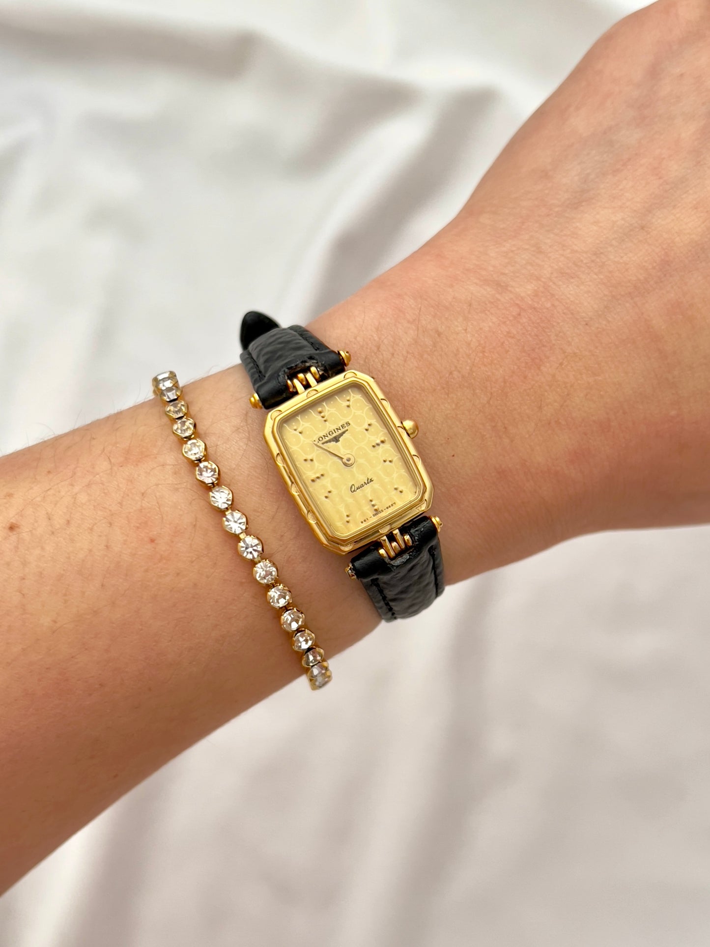 Longines Gold Toned Rectangular Womans Watch with Intricate Details