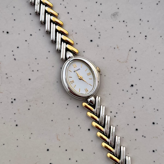 Seiko Ladies Two Tone Oval Herringbone Bracelet Watch