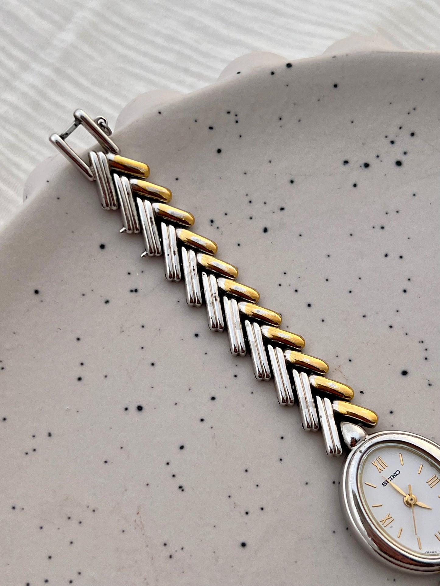 Seiko Ladies Two Tone Oval Herringbone Bracelet Watch
