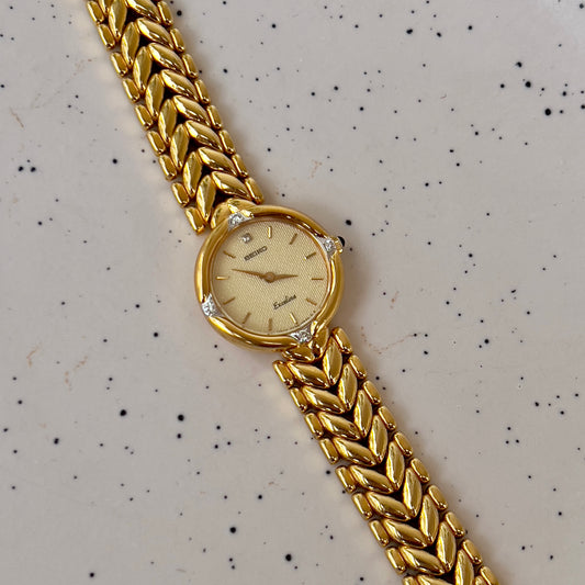 Seiko Exceline Woman's Watch with Diamonds and Sculpted Pattern Bracelet