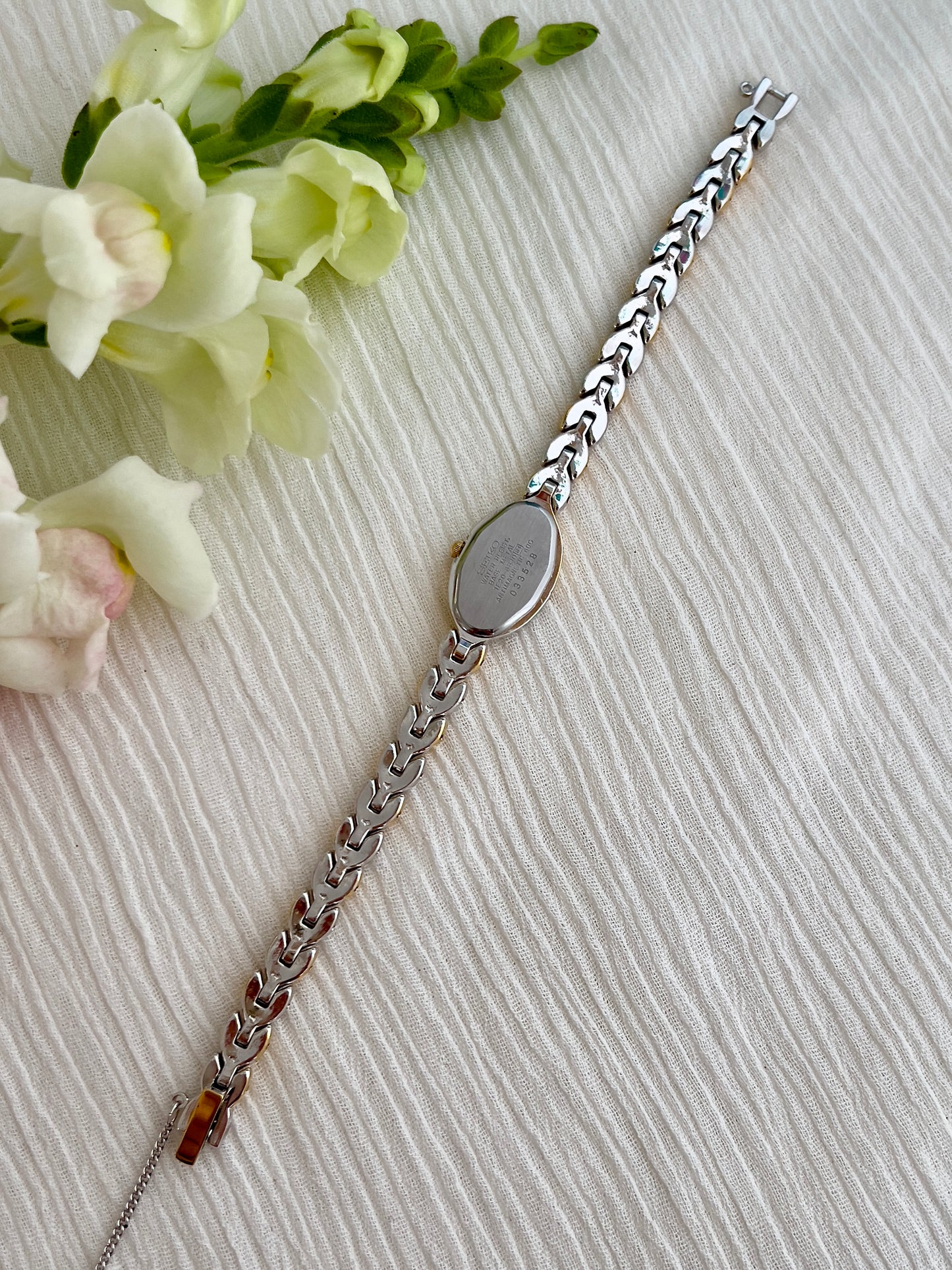 Seiko Ladies Teardrop Watch with Two Tone Leaf Link Bracelet and White Dial