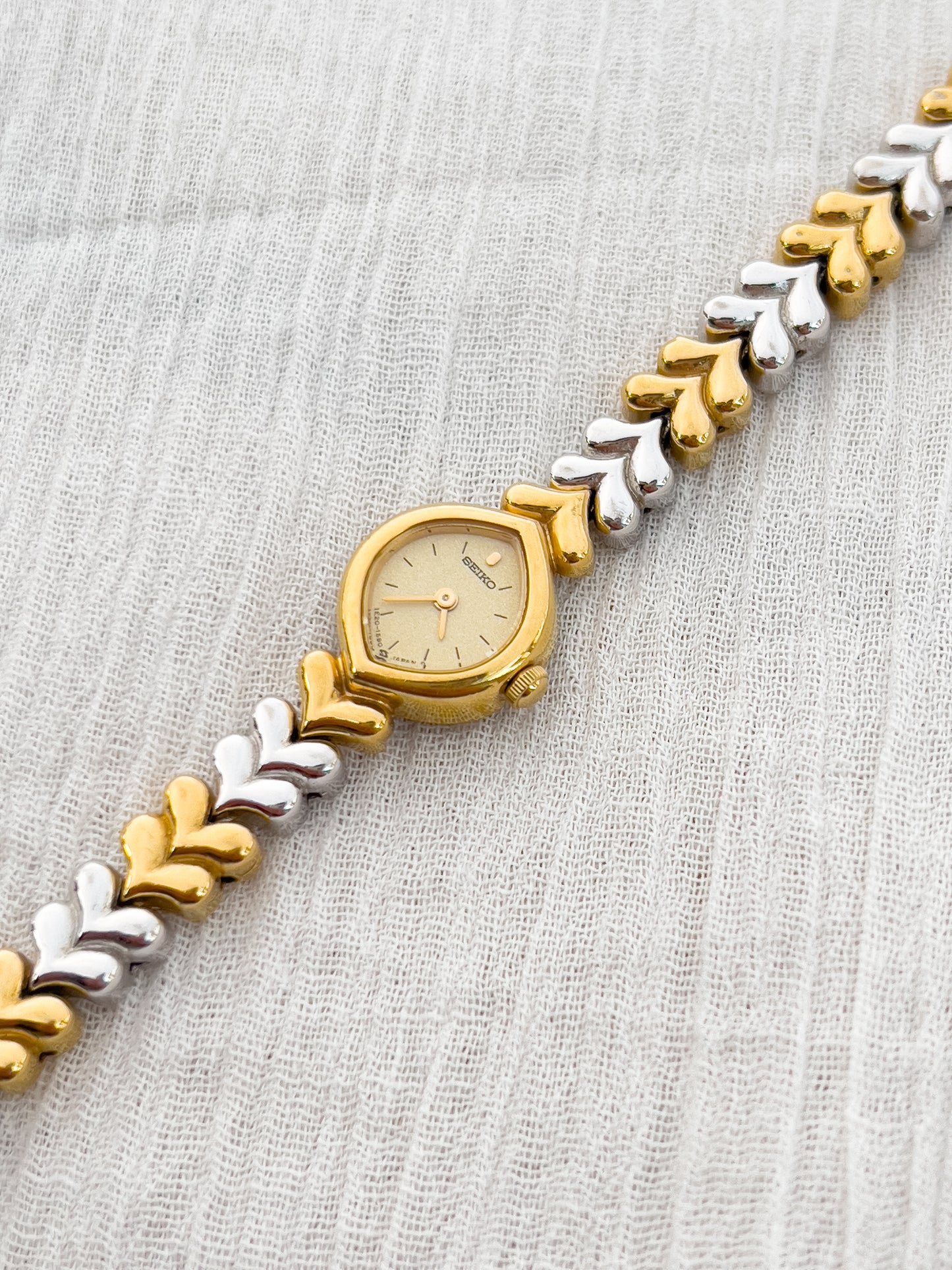 Seiko Gold-Tone Tear Drop Watch with Two-Tone Leaf-Link Bracelet