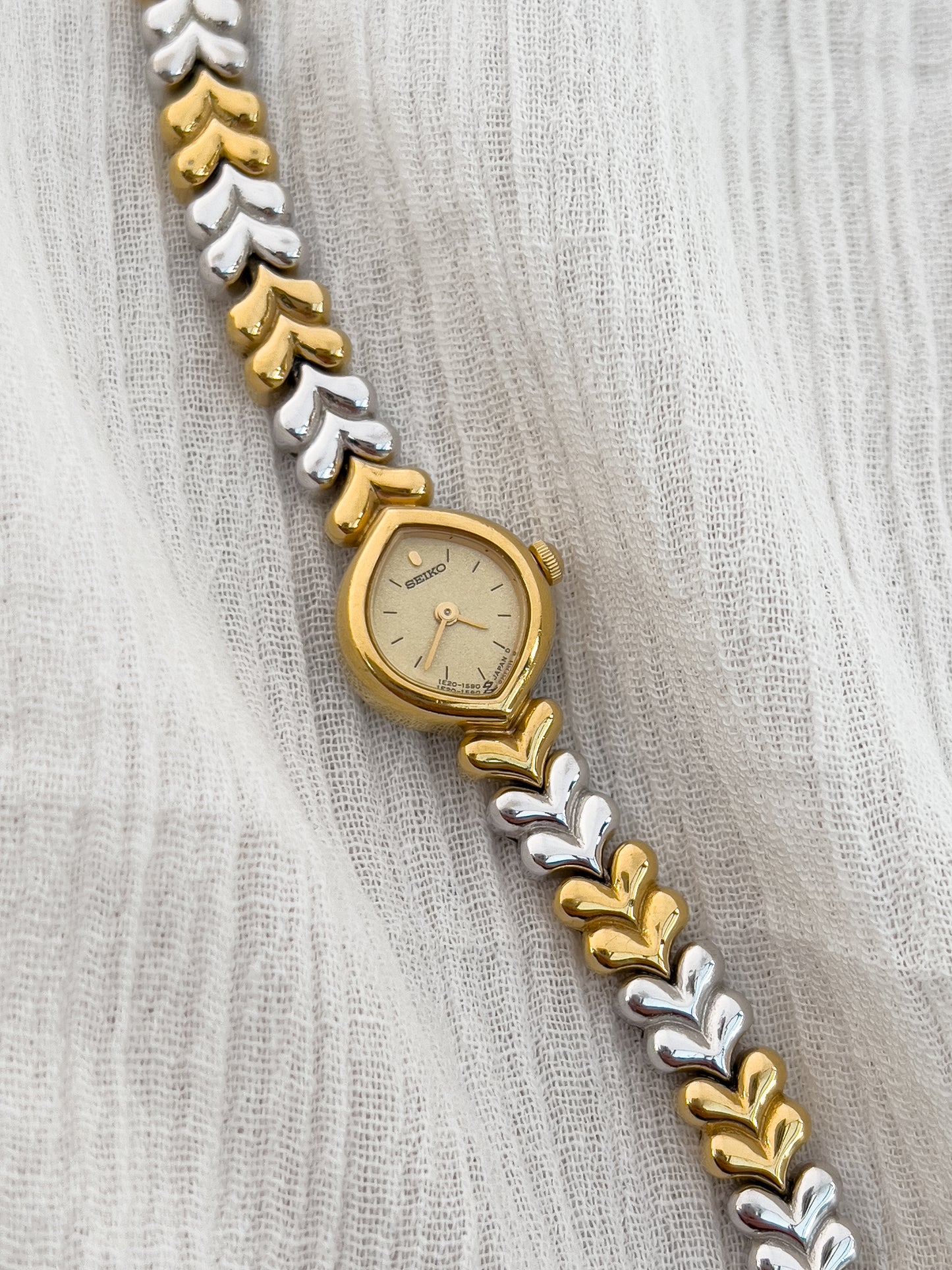 Seiko Gold-Tone Tear Drop Watch with Two-Tone Leaf-Link Bracelet