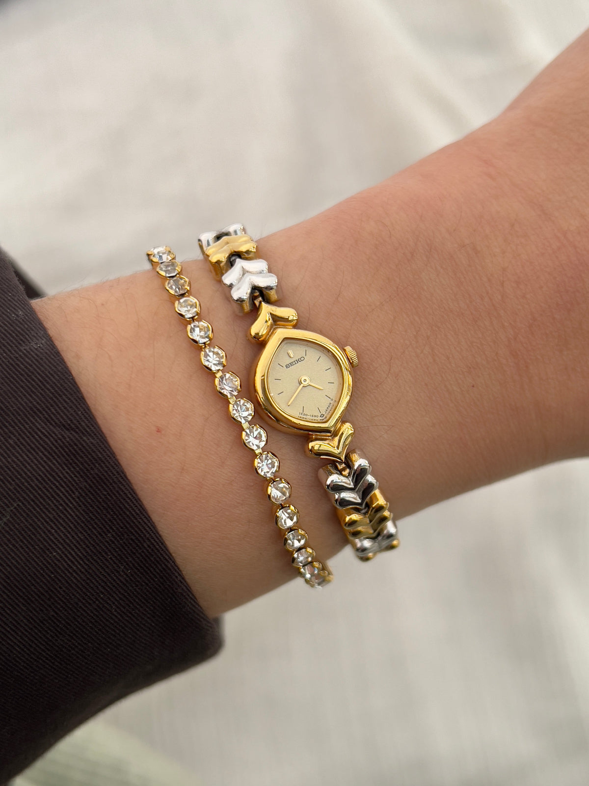 Vintage Seiko ladies’ watch with gold-tone teardrop case and silver-gold leaf link bracelet – elegant petite women’s quartz watch from Gilded Hour NZ.