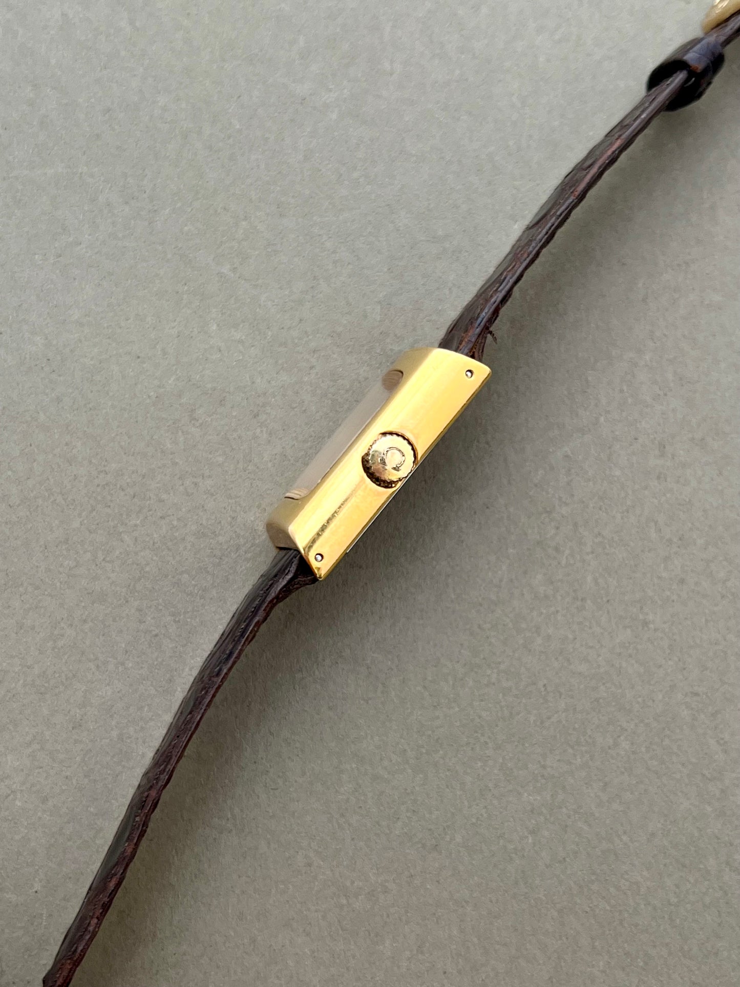 Omega De Ville Ladies Gold Rectangular Watch with Chequered Dial