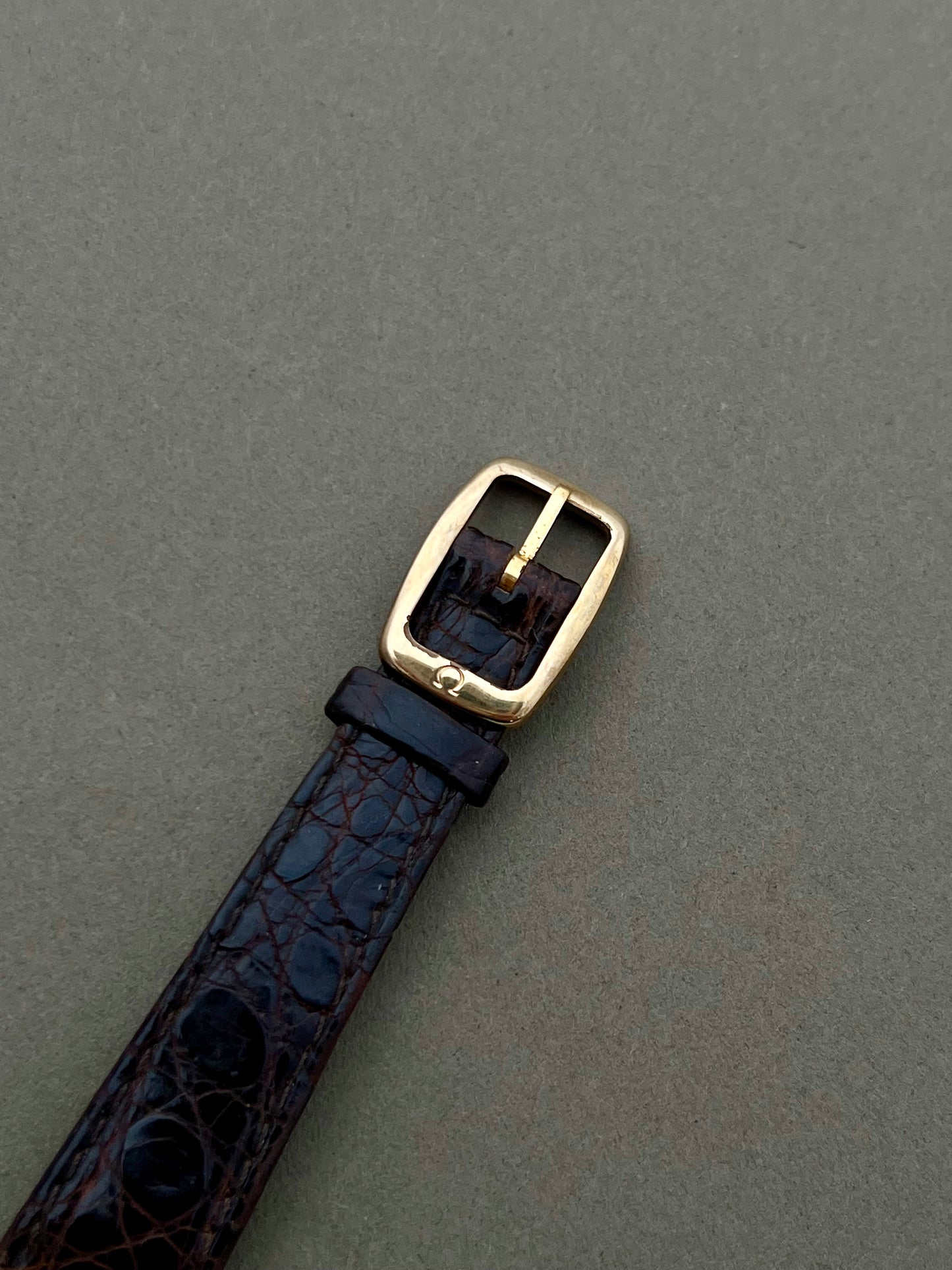 Omega De Ville Ladies Gold Rectangular Watch with Chequered Dial