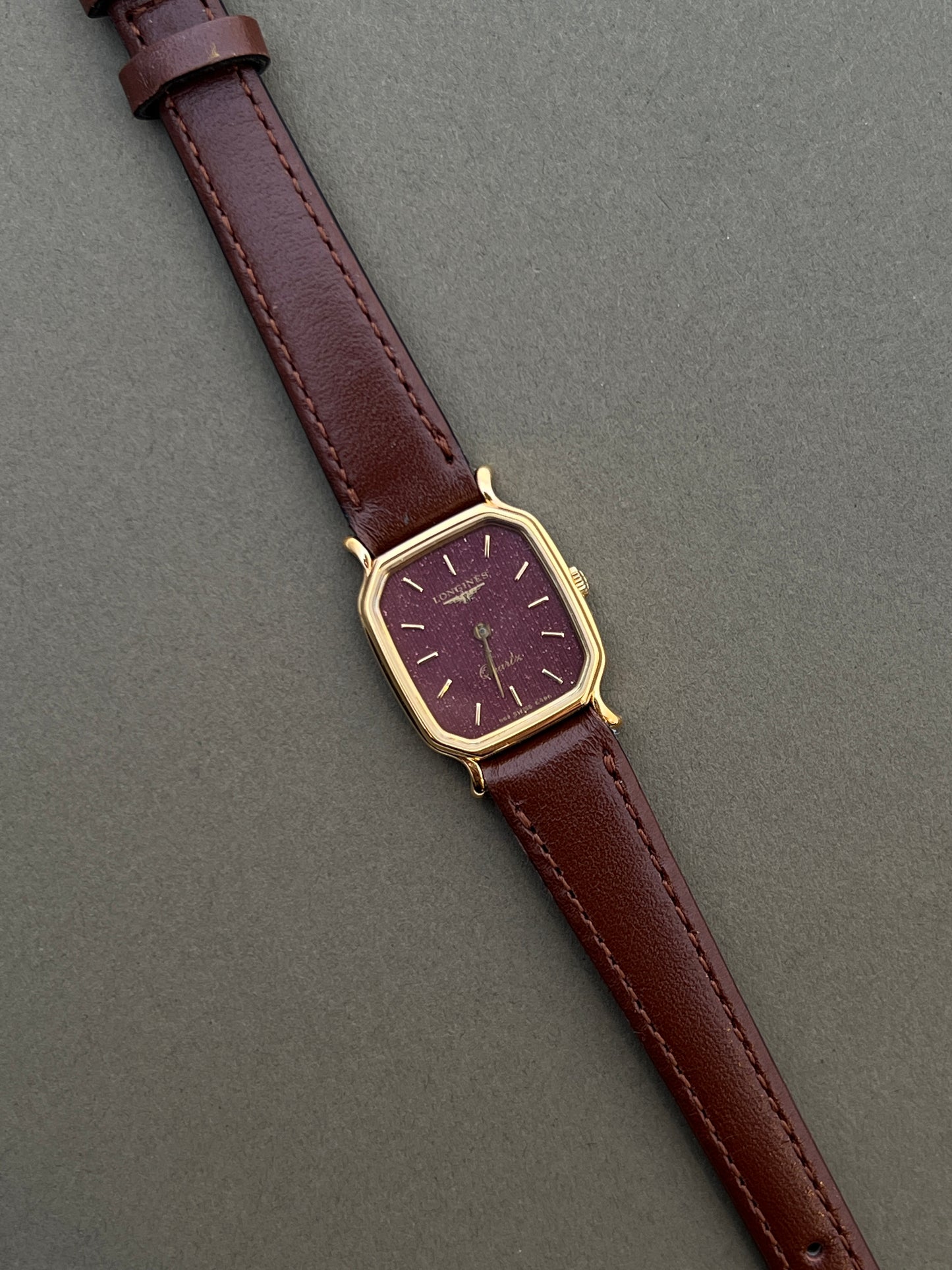 Longines Ladies Gold Cushion Watch with Stardust Wine Dial