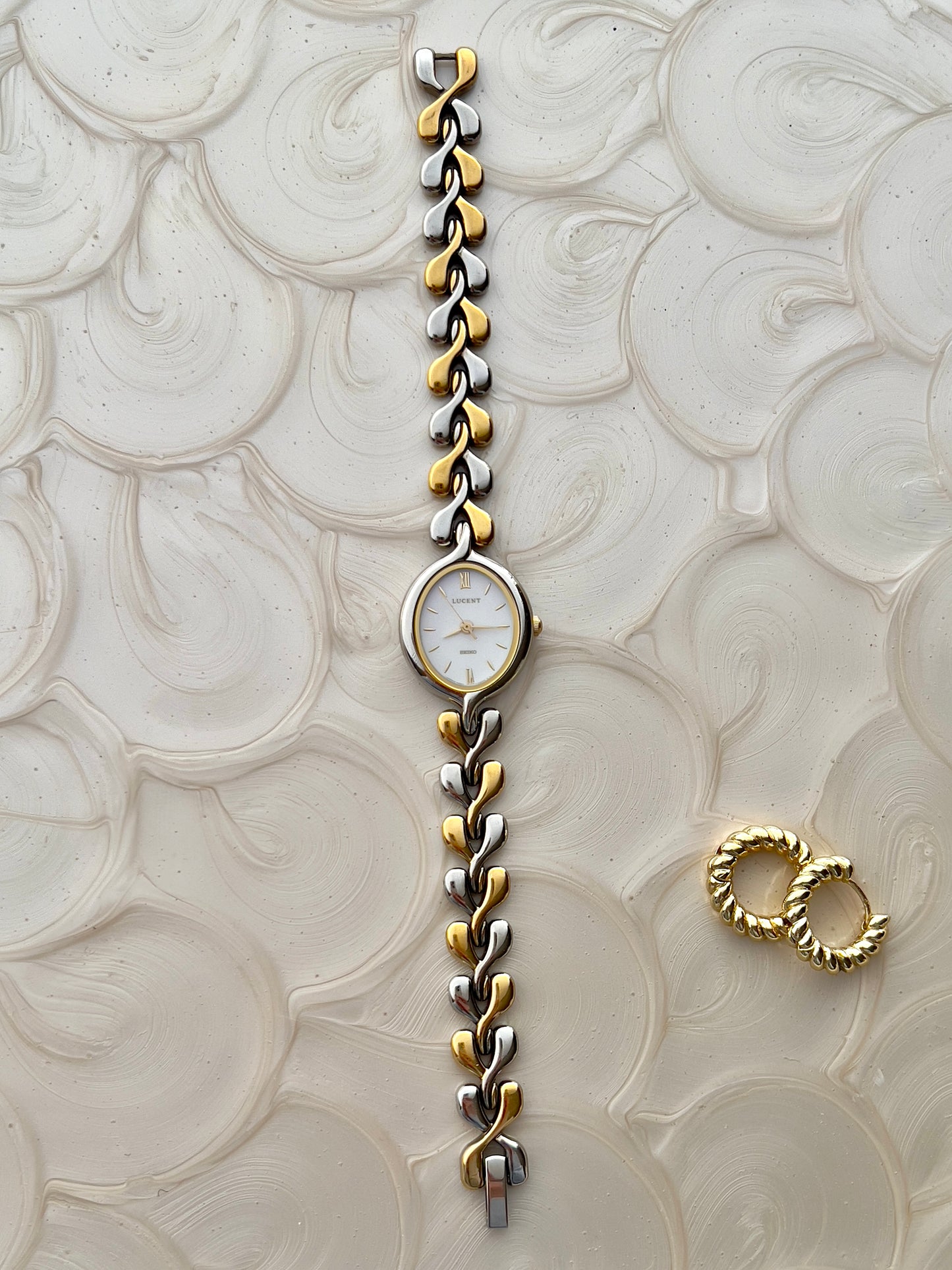 Seiko Lucent Woman's Watch with a Pink Pearlescent Dial