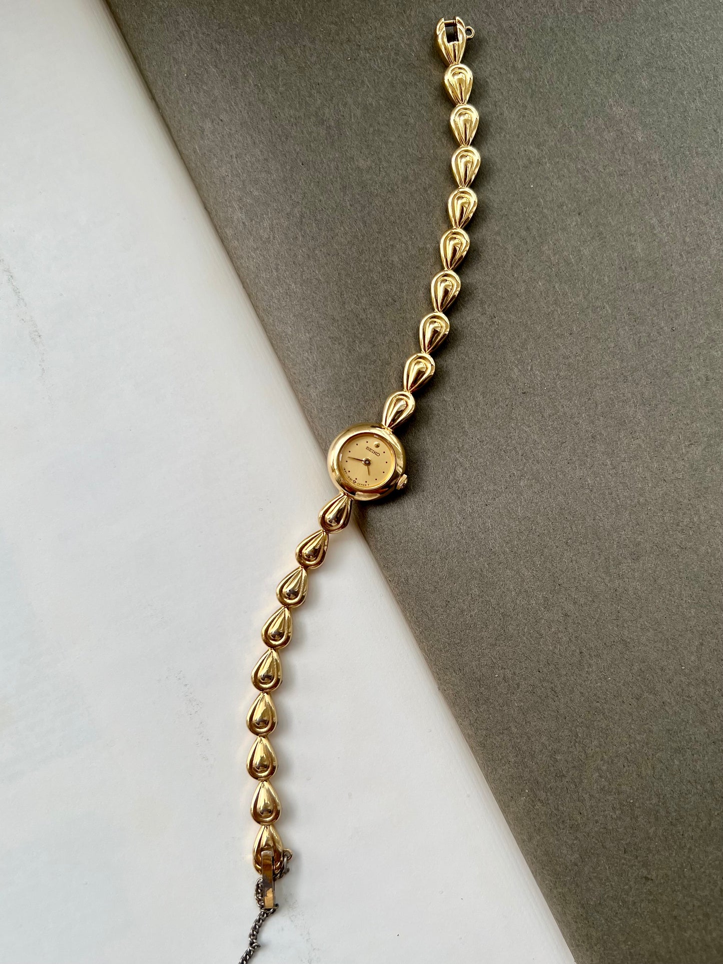 Seiko Ladies Gold Teardrop Bracelet Watch with Champagne Dial