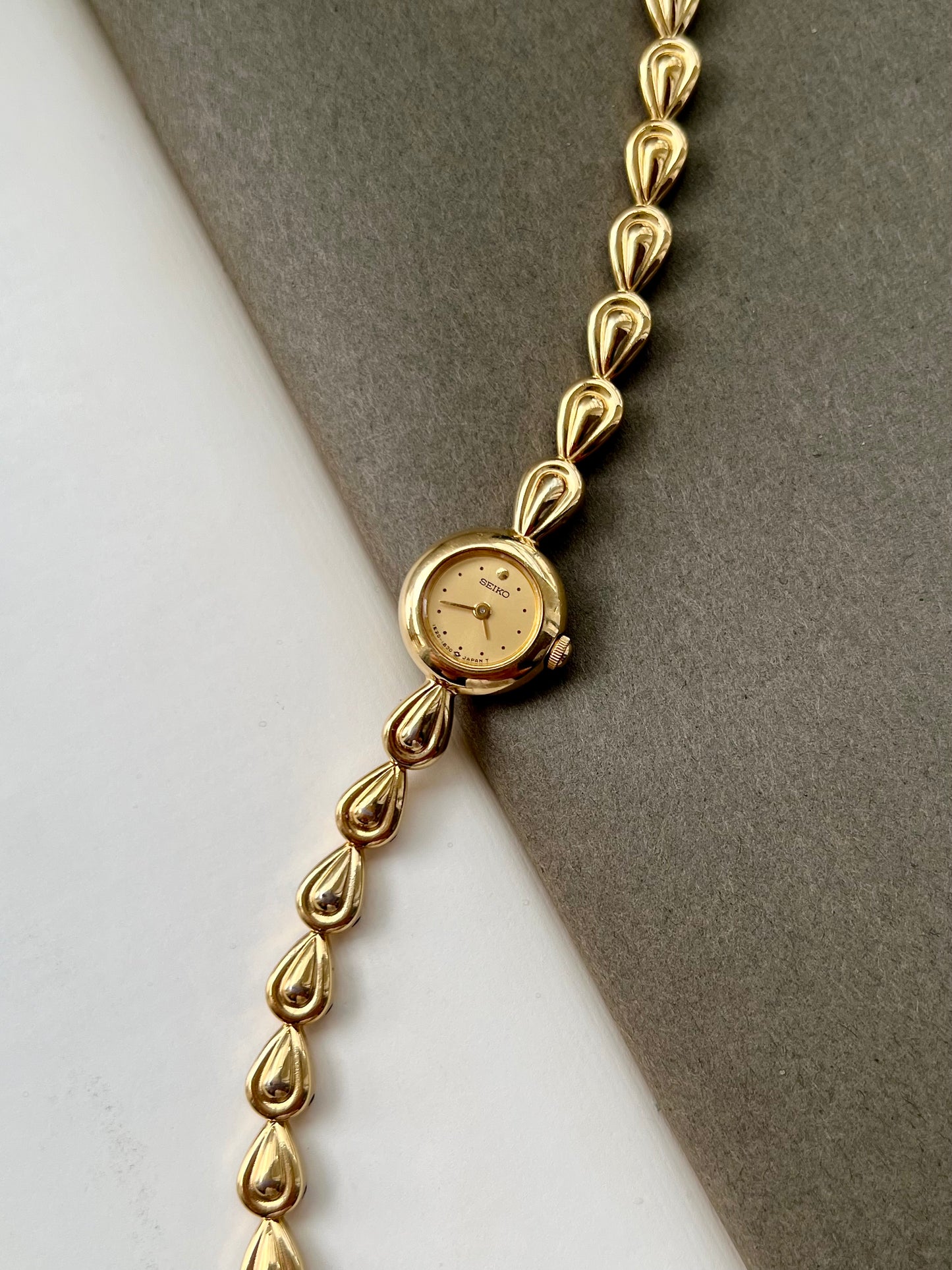 Seiko Ladies Gold Teardrop Bracelet Watch with Champagne Dial