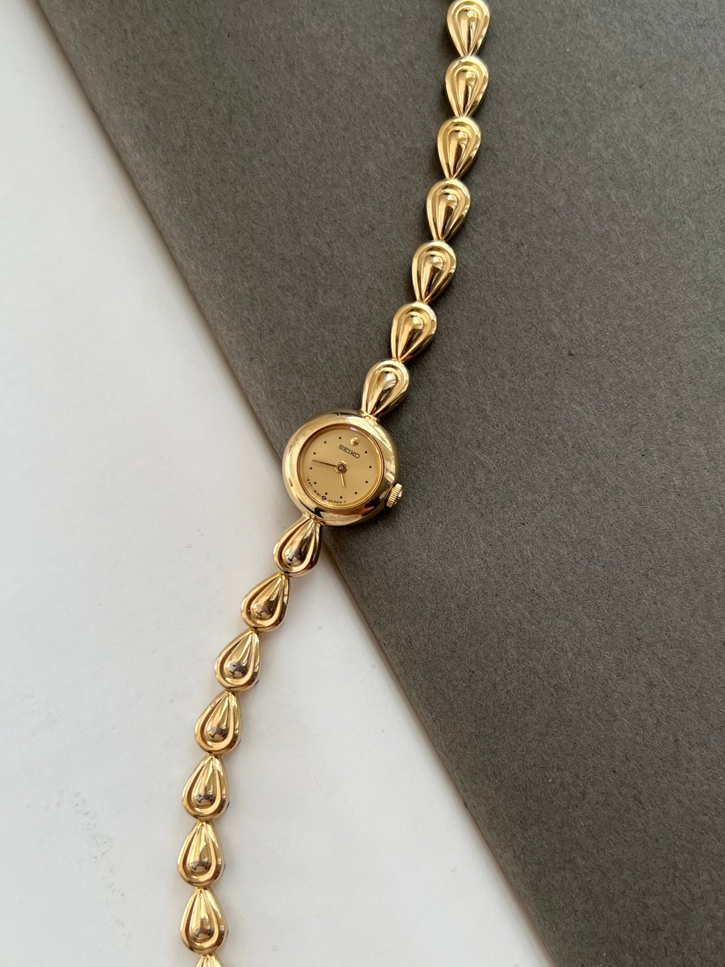 Seiko Ladies Gold Teardrop Bracelet Watch with Champagne Dial