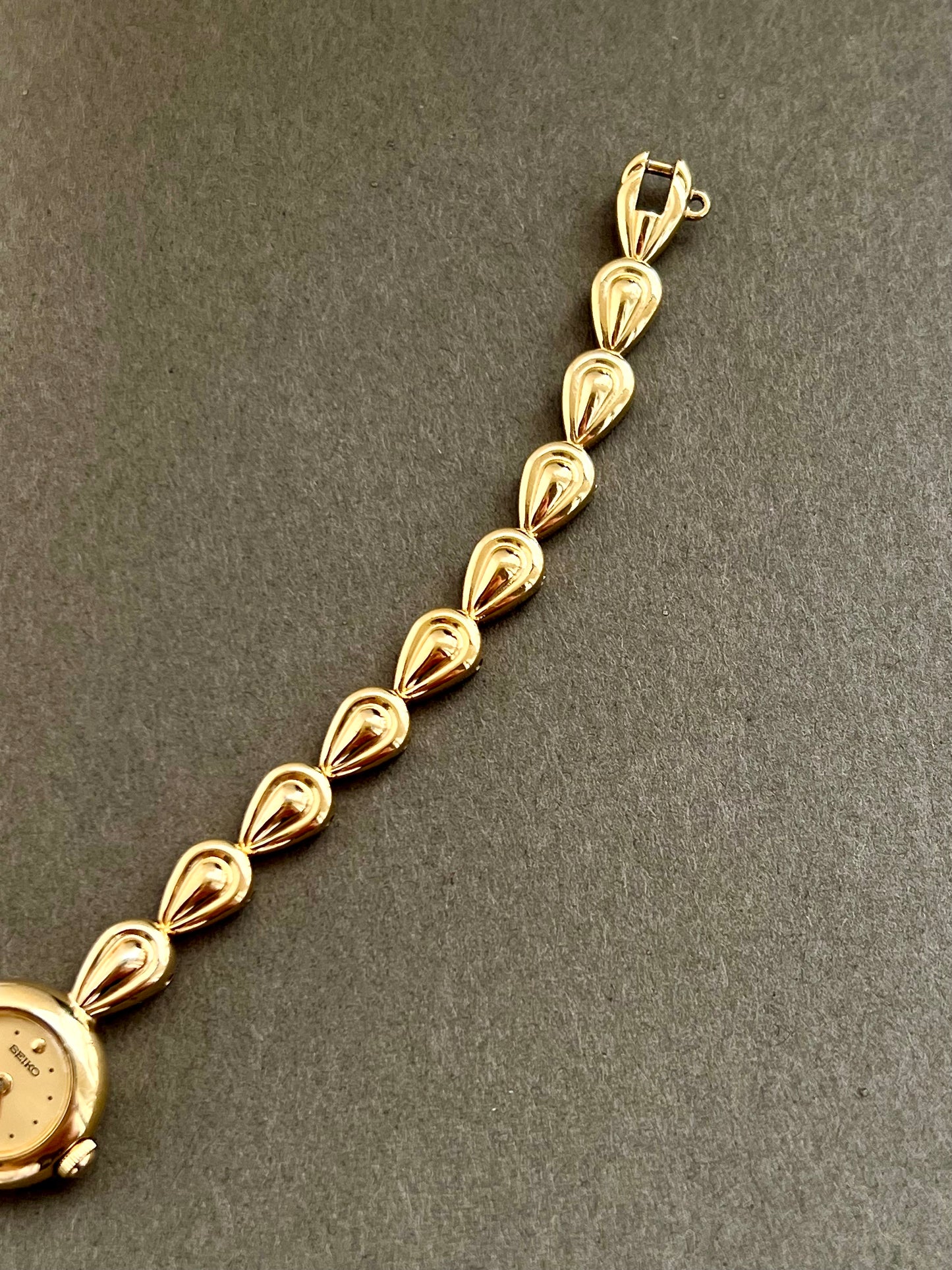 Seiko Ladies Gold Teardrop Bracelet Watch with Champagne Dial