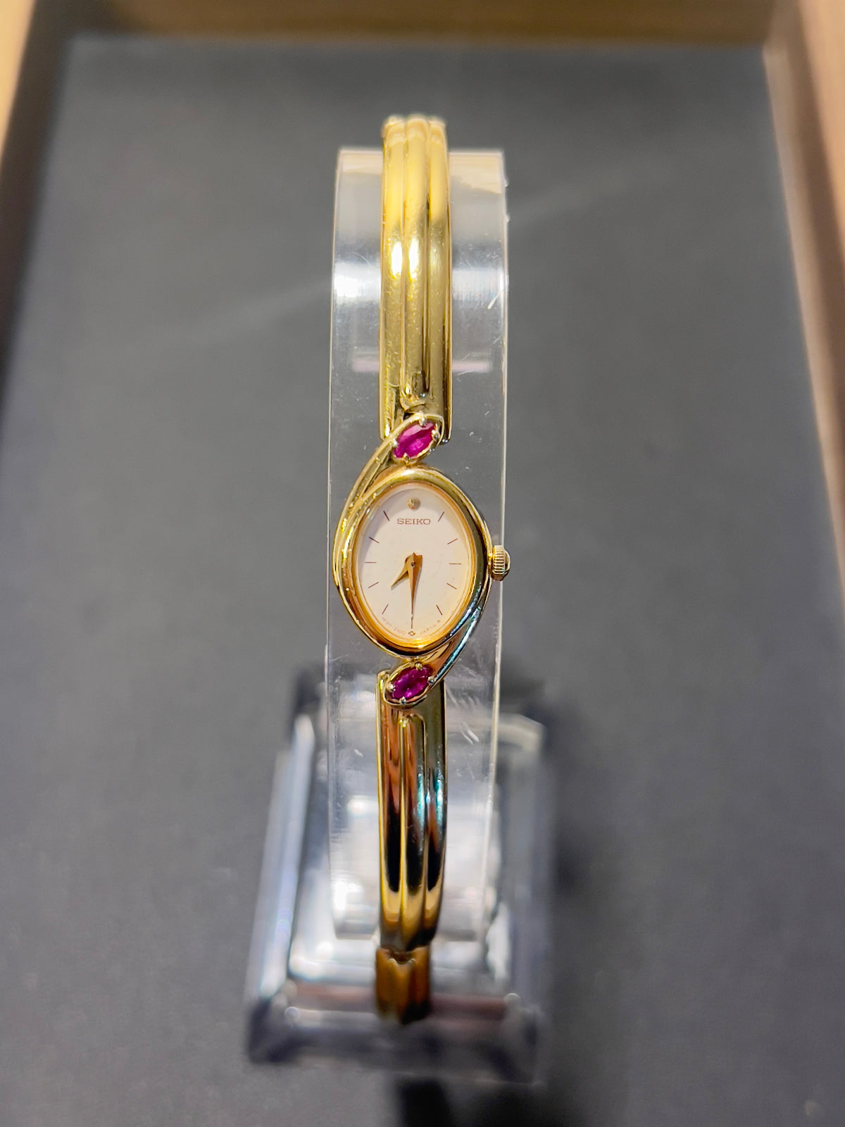 Seiko Gold Bangle Watch with Rubies