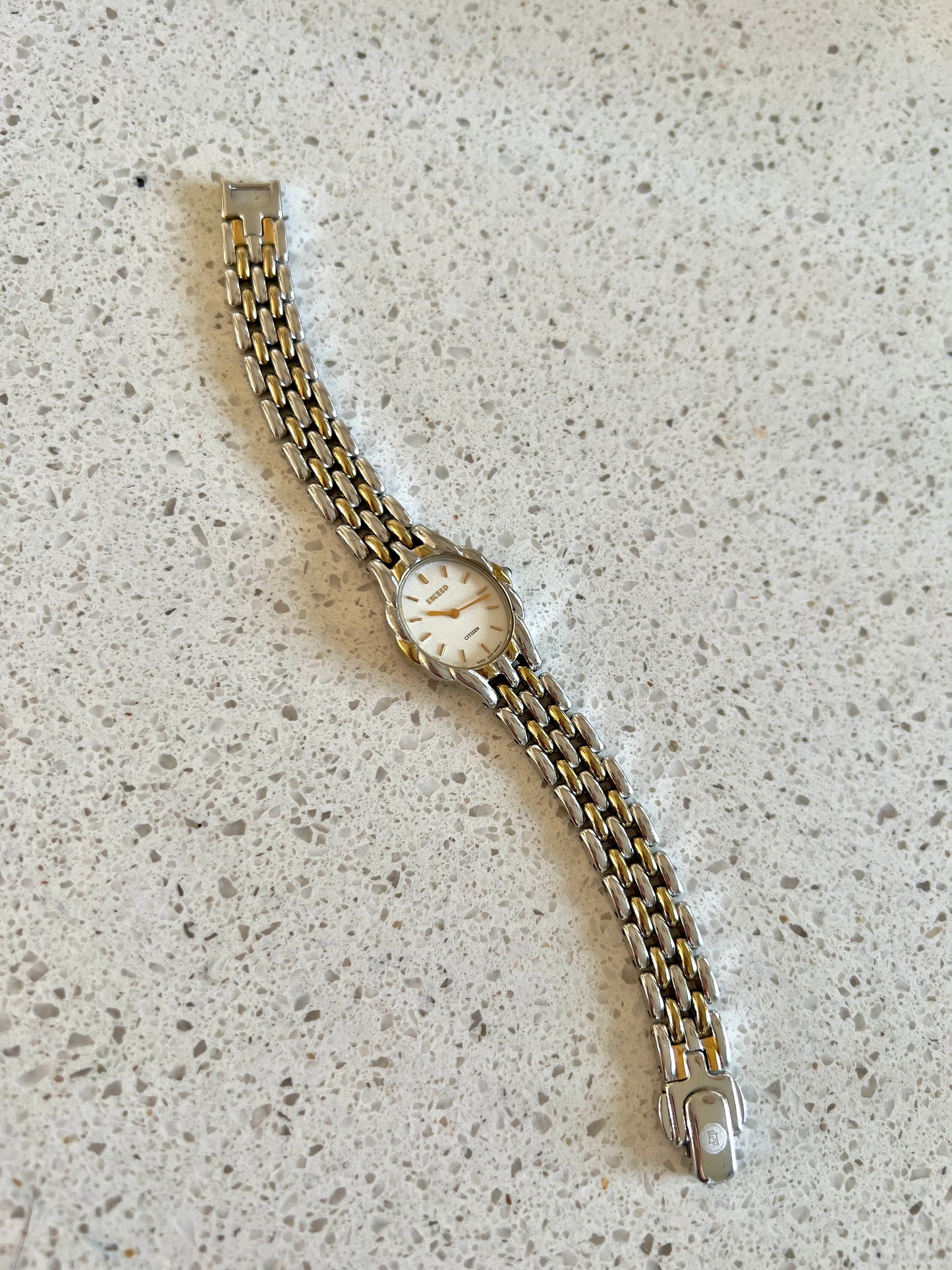 Citizen Womans Watch with a Volcanic Patterned Case & Green Crown Stone