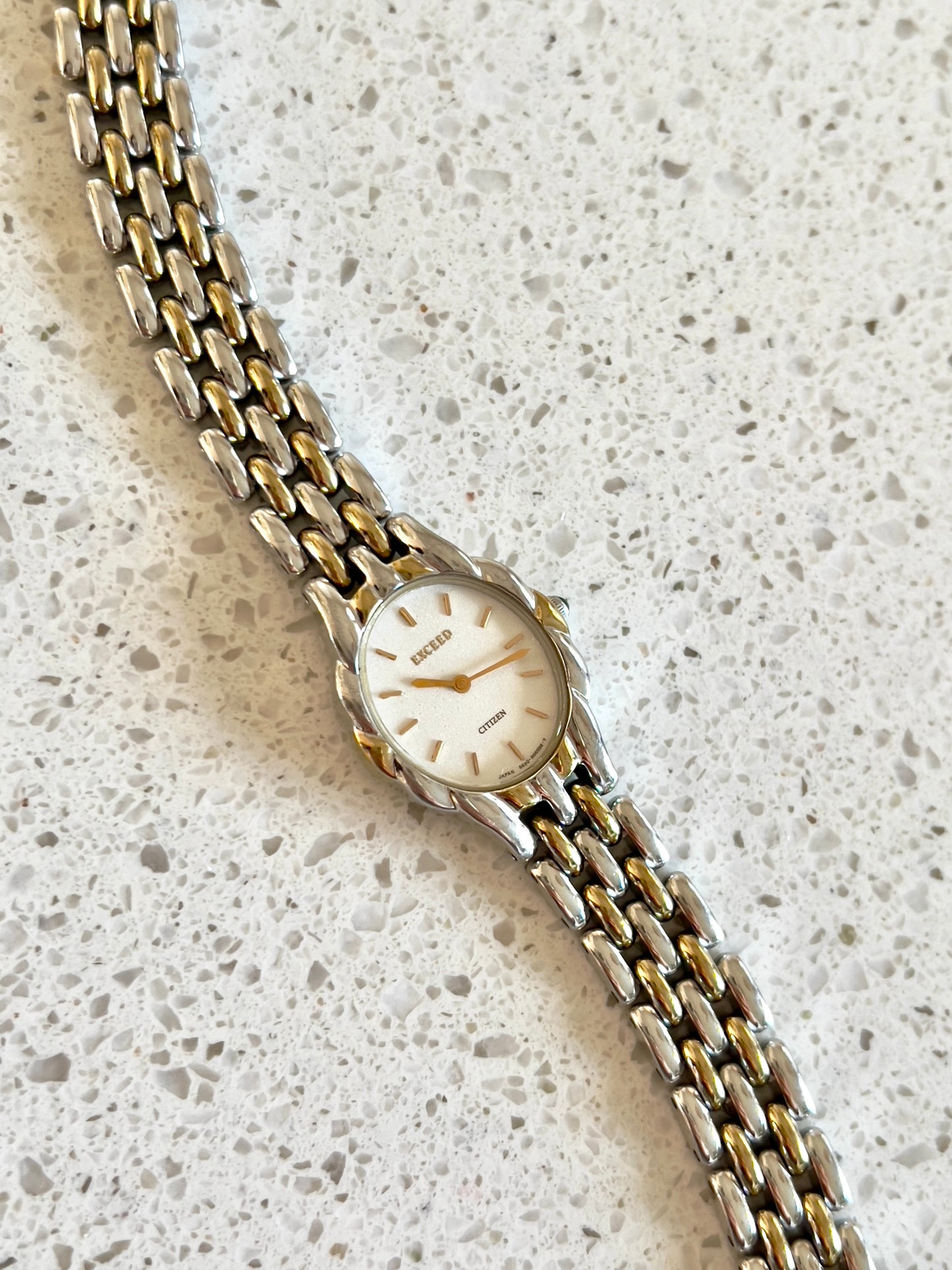 Citizen Womans Watch with a Volcanic Patterned Case & Green Crown Stone