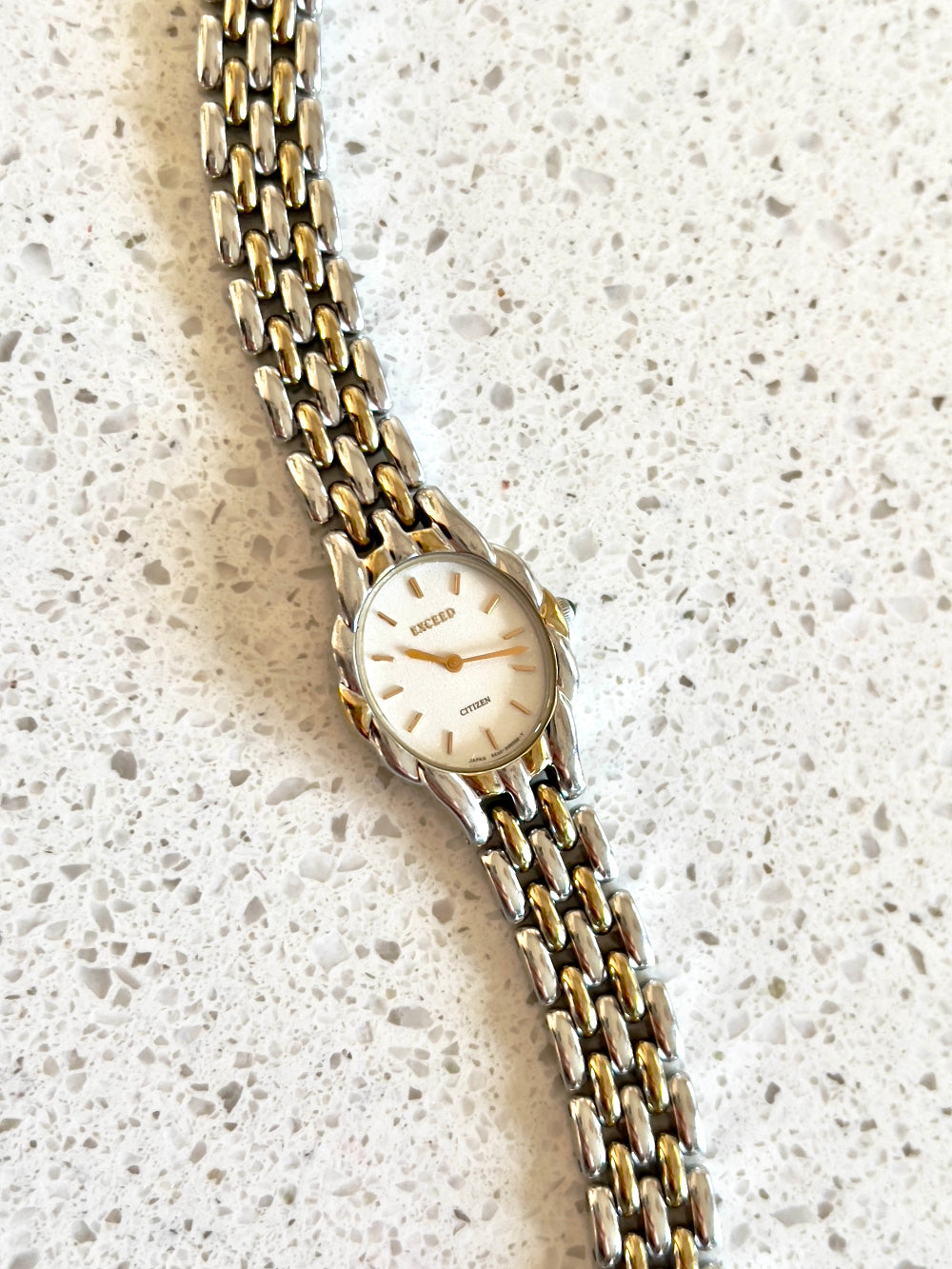 Citizen Womans Watch with a Volcanic Patterned Case & Green Crown Stone