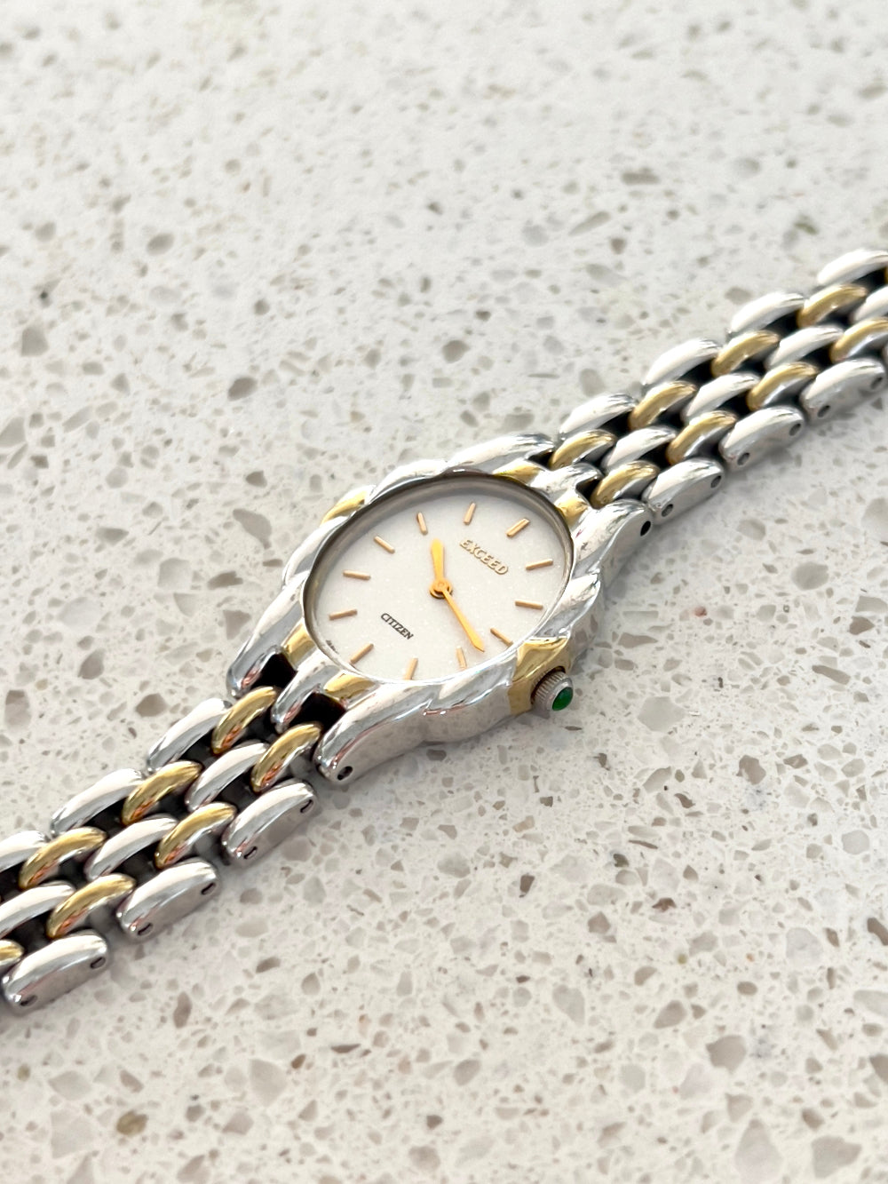 Citizen Womans Watch with a Volcanic Patterned Case & Green Crown Stone