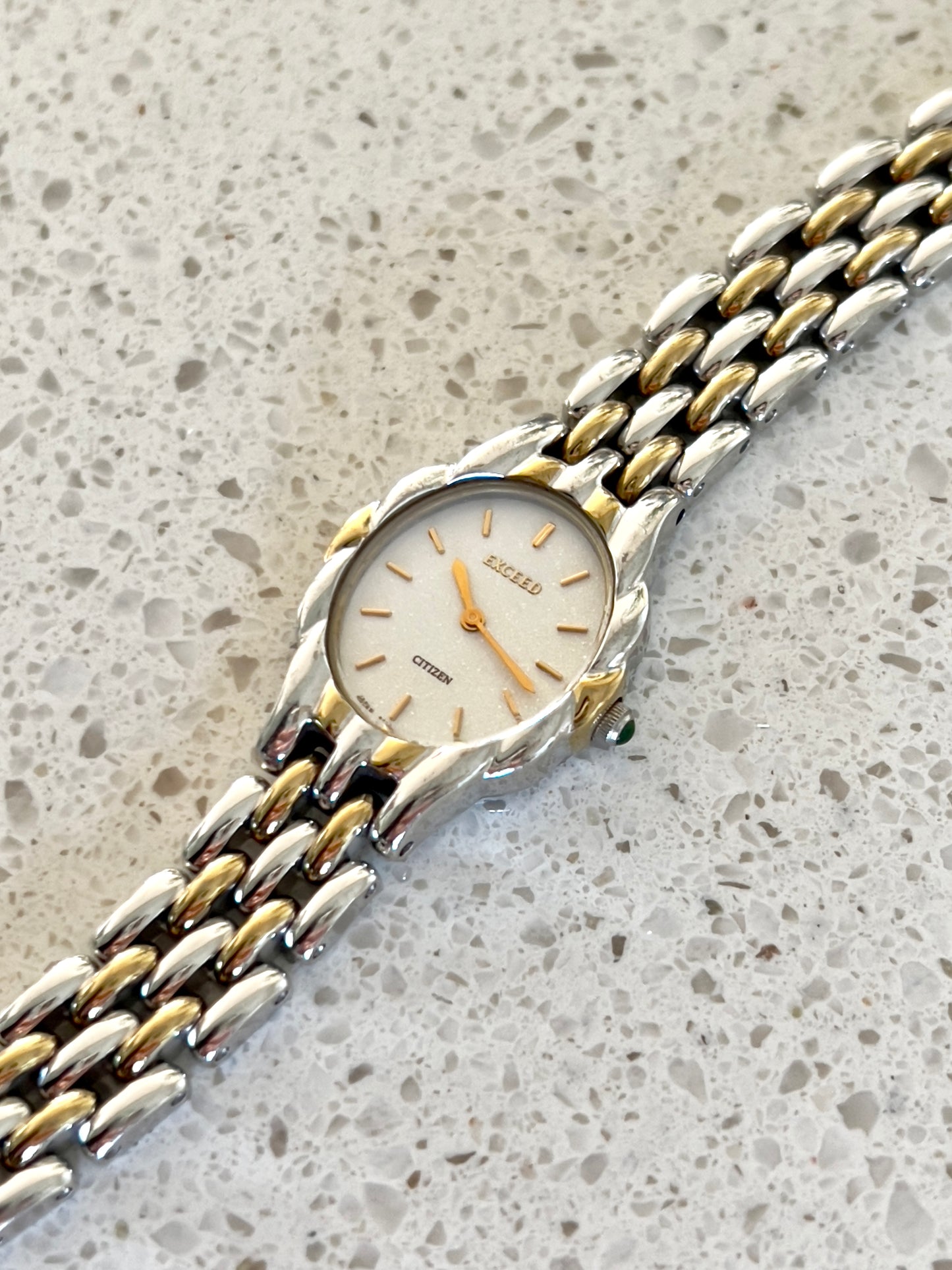 Citizen Womans Watch with a Volcanic Patterned Case & Green Crown Stone