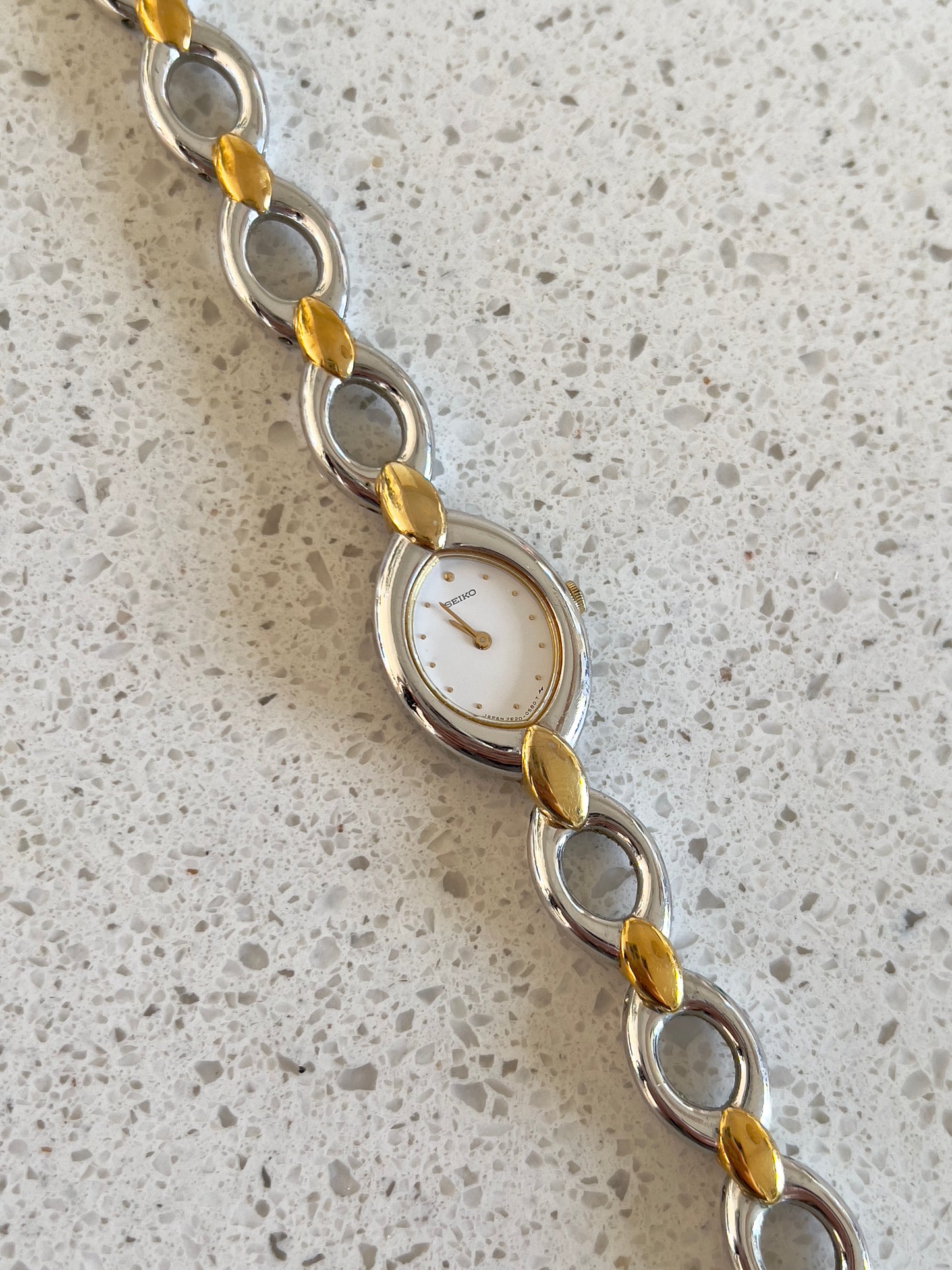 Seiko Two Toned Woman's Watch with Oval Linking Bracelet