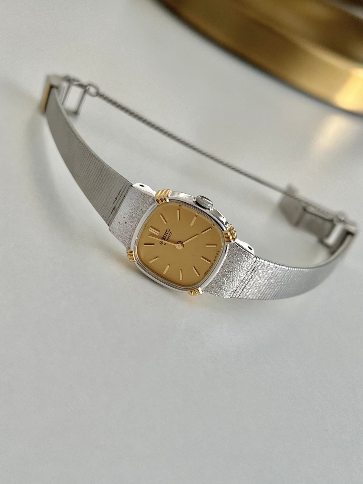 Seiko Gold Dial Cushion Women’s Watch, caseback detail of a vintage women's watch at Gilded Hour.