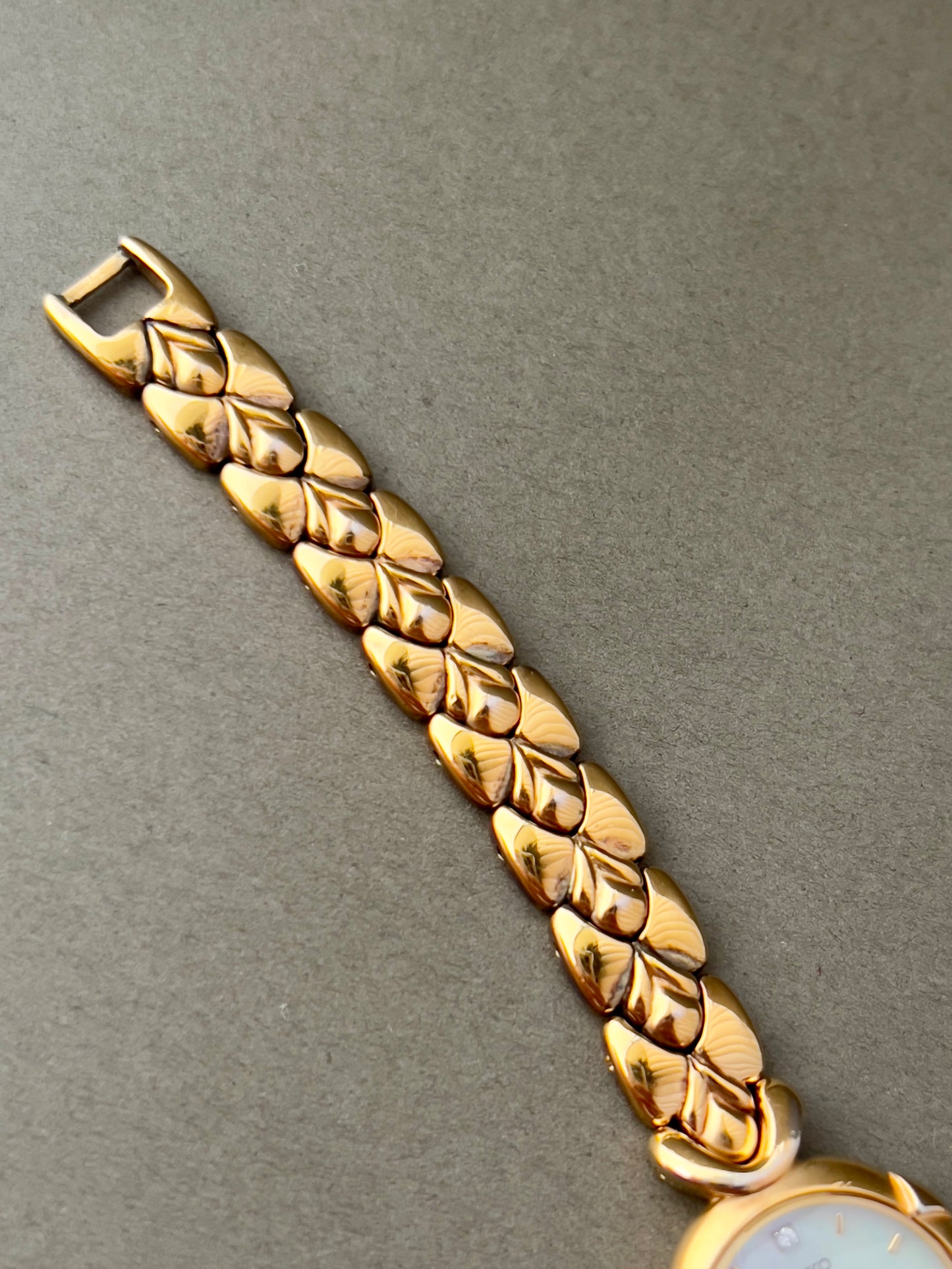 Seiko Exceline Gold Toned Woman's Watch with Radiant Mother of Pearl Dial