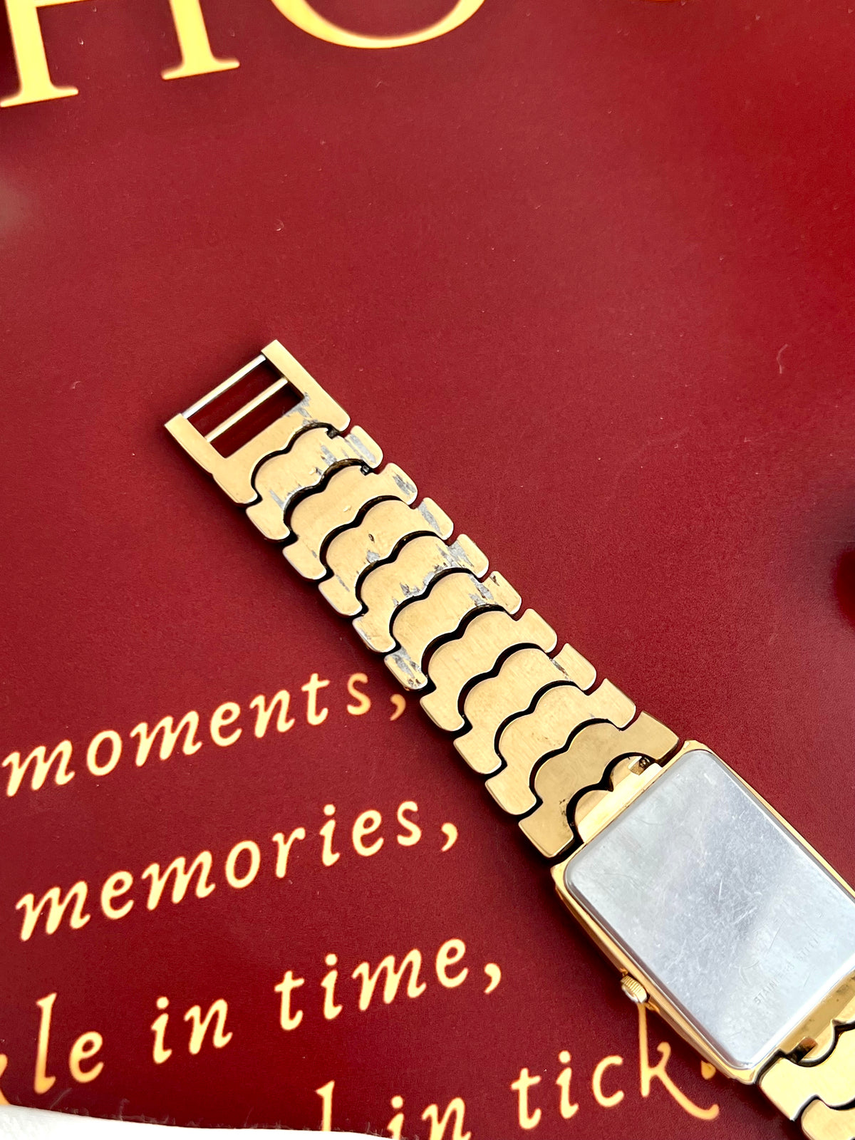 Longines Mother of Pearl Sculpted Watch: bracelet clasp and case back detail.