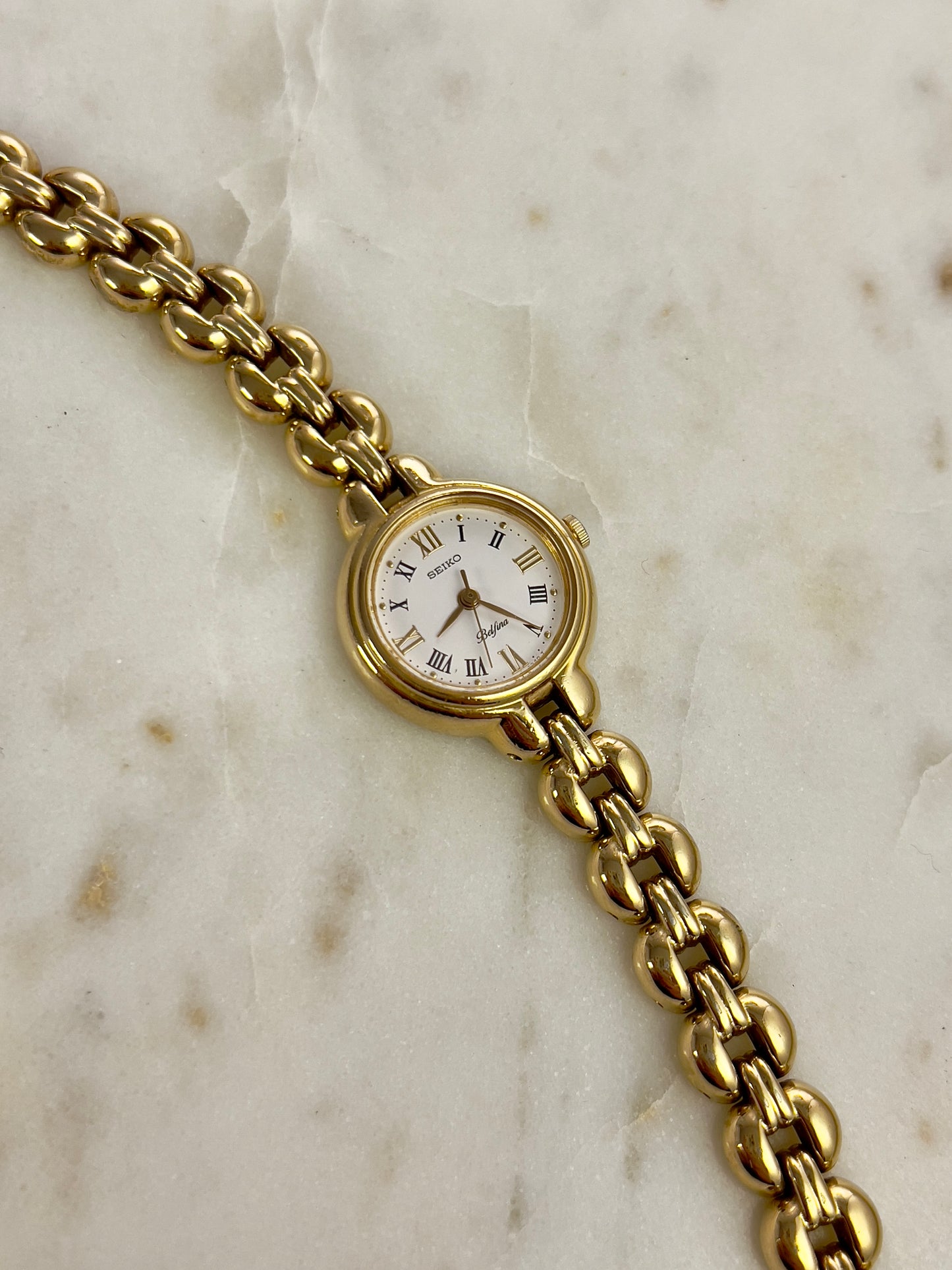 Seiko Belfina Gold Toned Round Woman's Watch