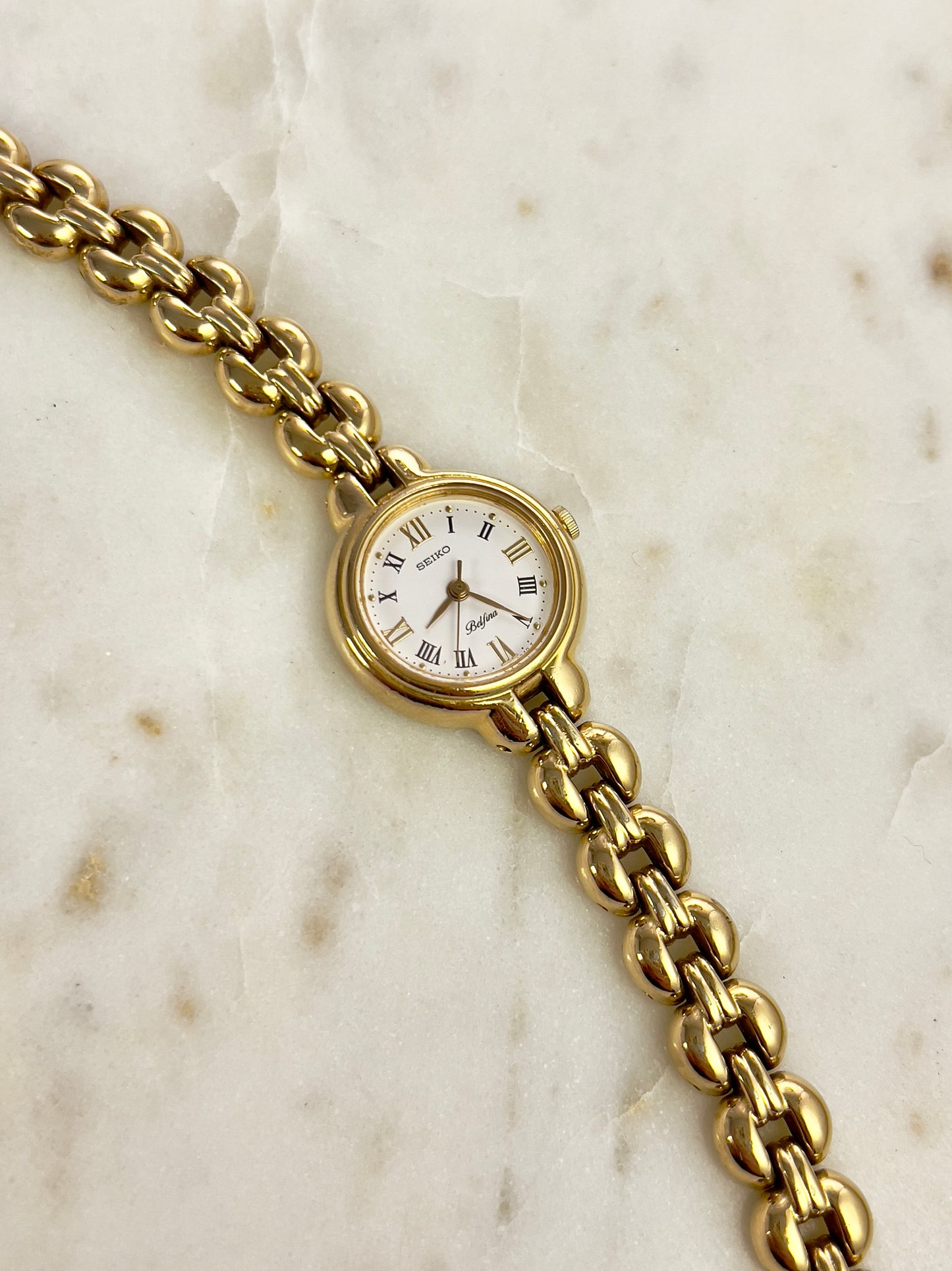 Seiko Belfina Gold Toned Round Woman's Watch