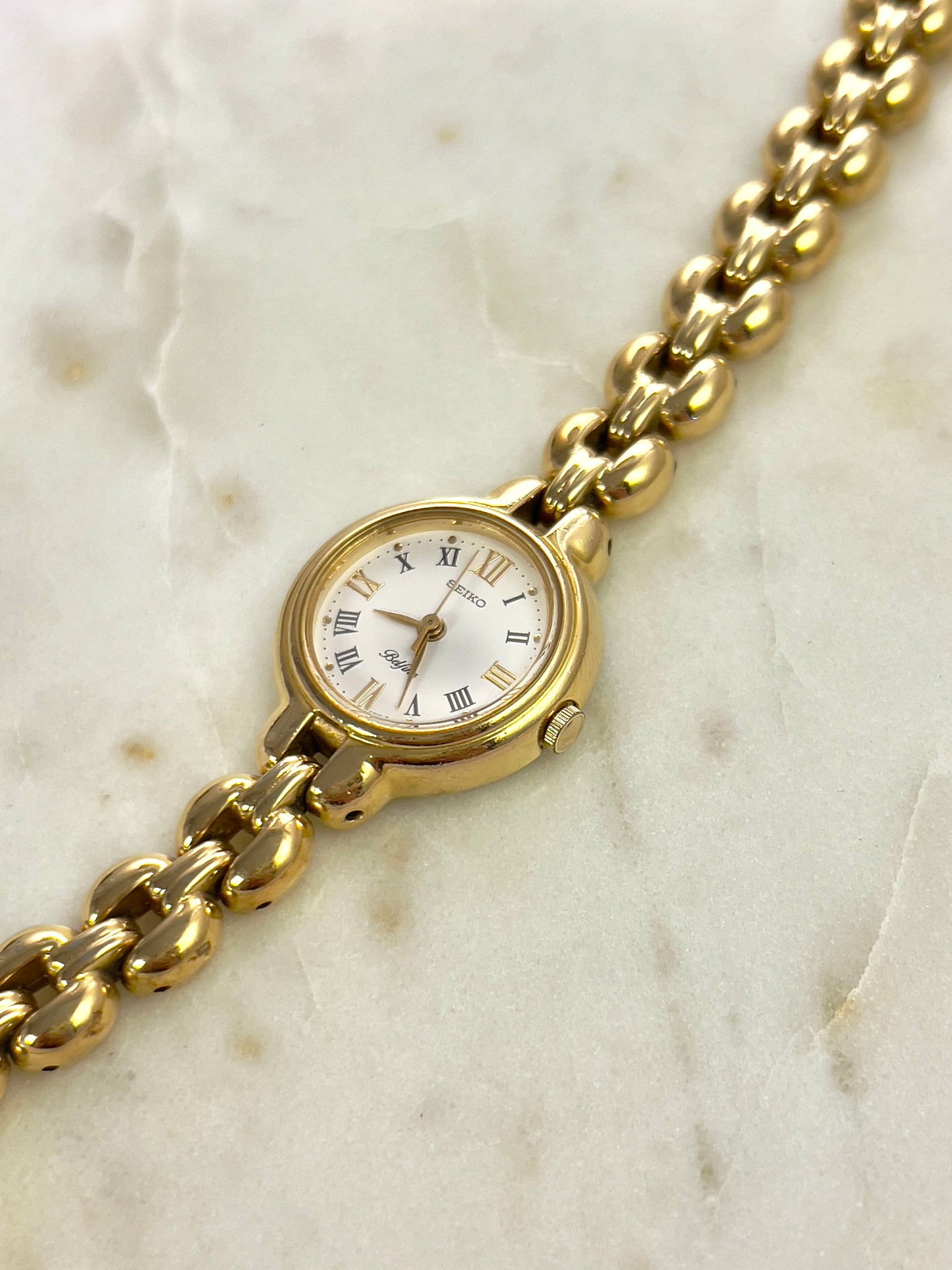 Seiko Belfina Gold Toned Round Woman's Watch