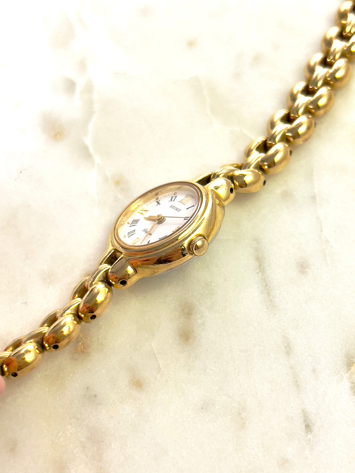 Seiko Belfina Gold Toned Round Woman's Watch