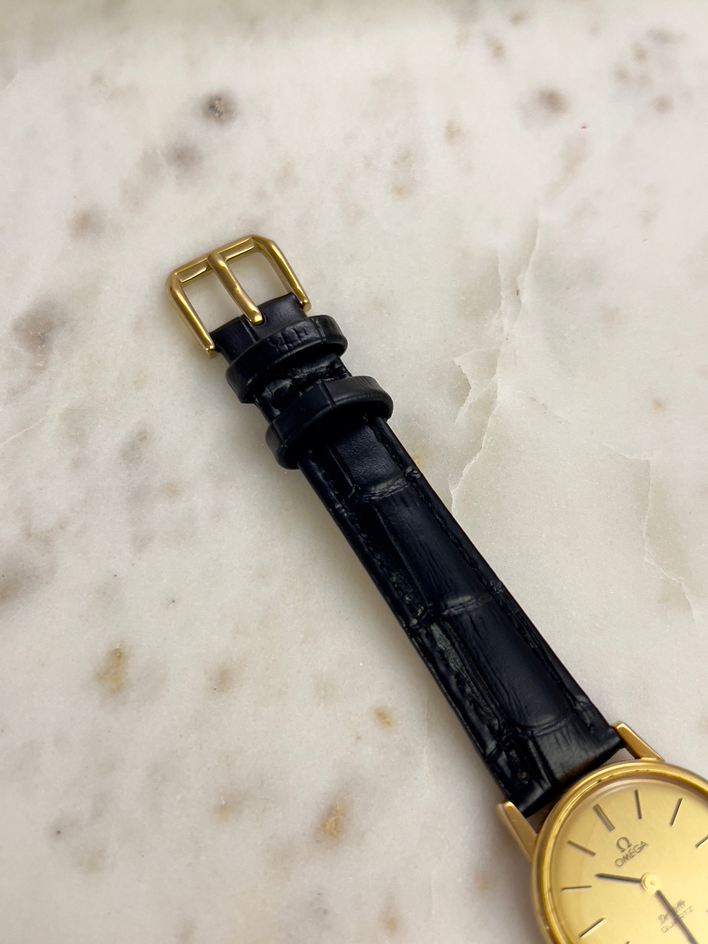 Omega Round Gold Toned Woman's Watch
