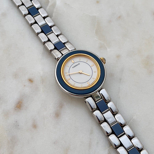 Seiko Lassale Watch with a blue and silver strap on a marble surface
