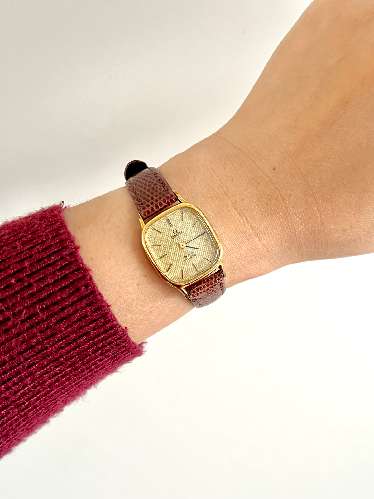 Omega De Ville Gold Women's Watch with Chequered Dial, caseback detail of a vintage women's watch at Gilded Hour.