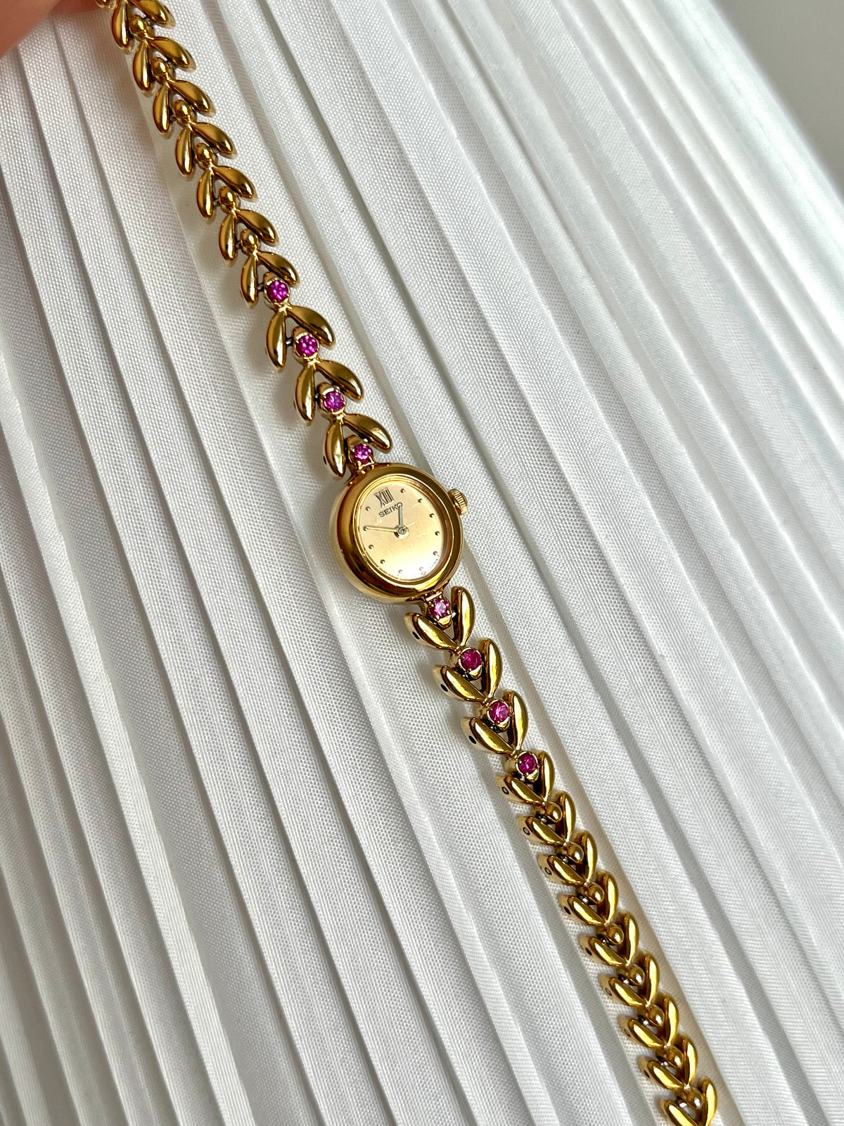 Seiko Tisse Tennis Bracelet Women's Watch with Pink Rubies, caseback detail of a vintage women's watch at Gilded Hour.