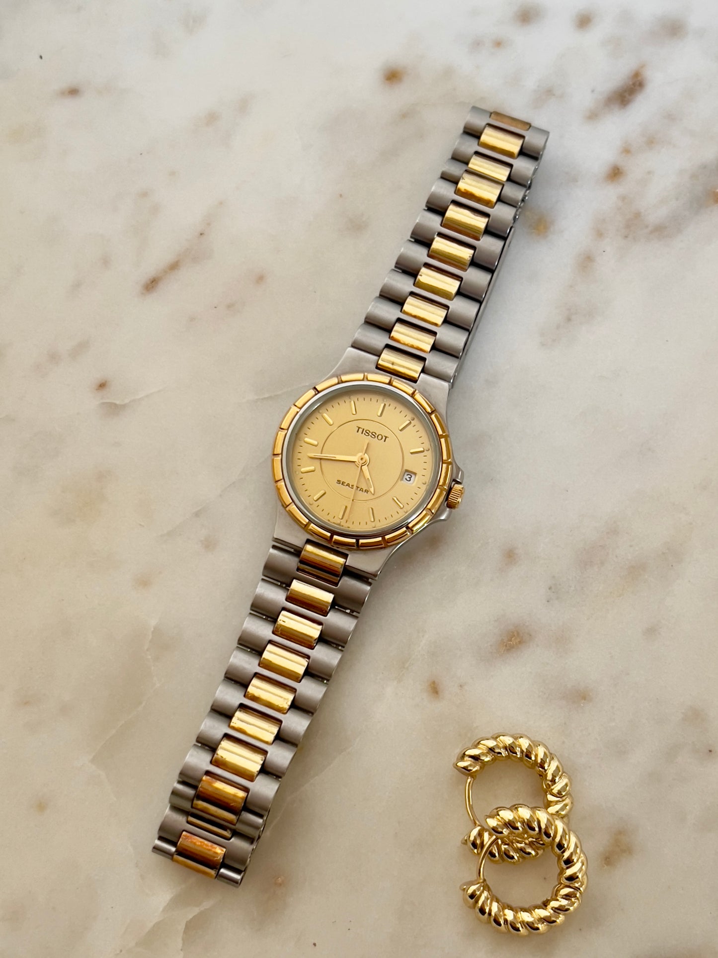 Tissot Seastar Two-Tone Watch with Sunburst Gold Dial and Date