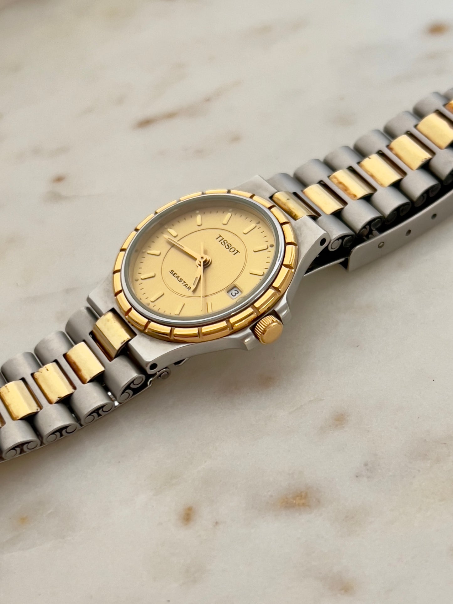 Tissot Seastar Two-Tone Watch with Sunburst Gold Dial and Date