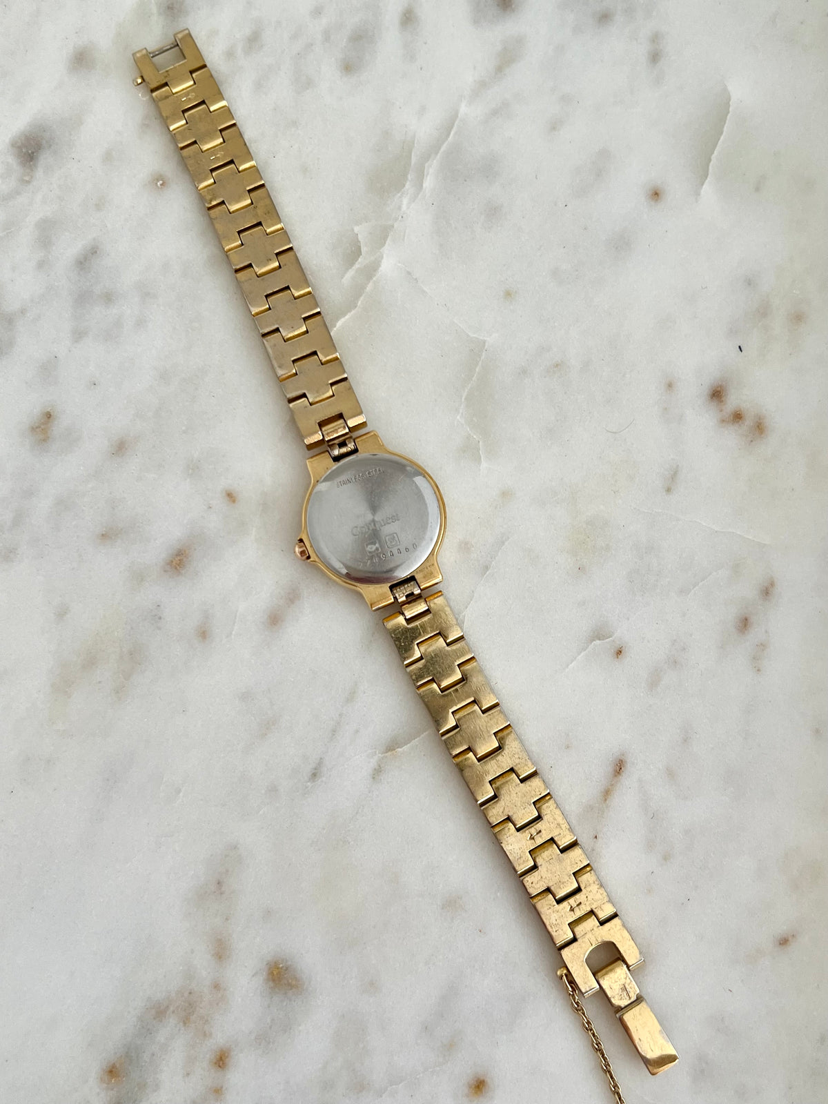 Longines Conquest Geometric Bracelet Watch, caseback detail of a vintage women's watch at Gilded Hour.