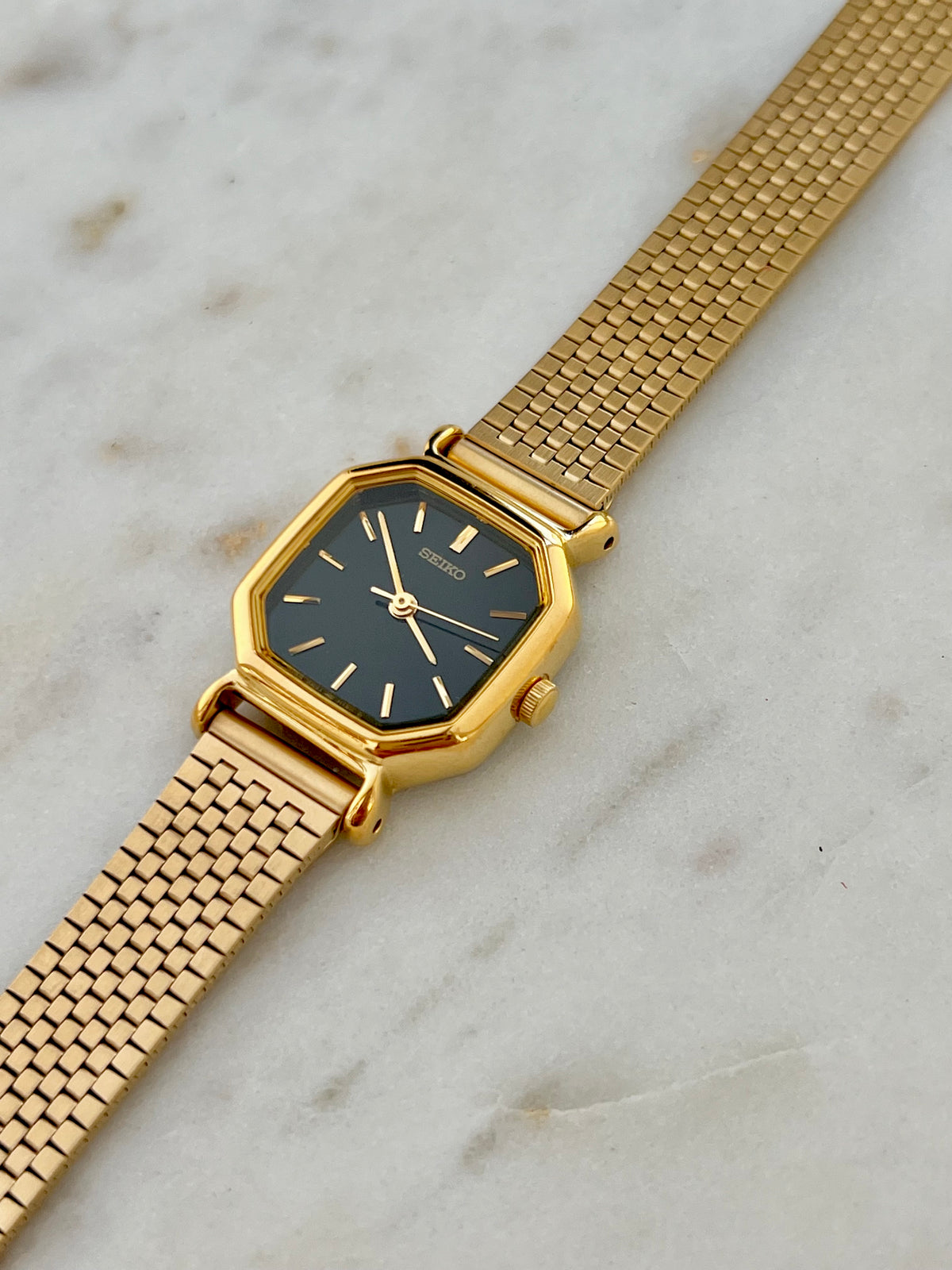 Seiko Octagonal Black Dial Bracelet Watch, case profile of a vintage women's watch at Gilded Hour.