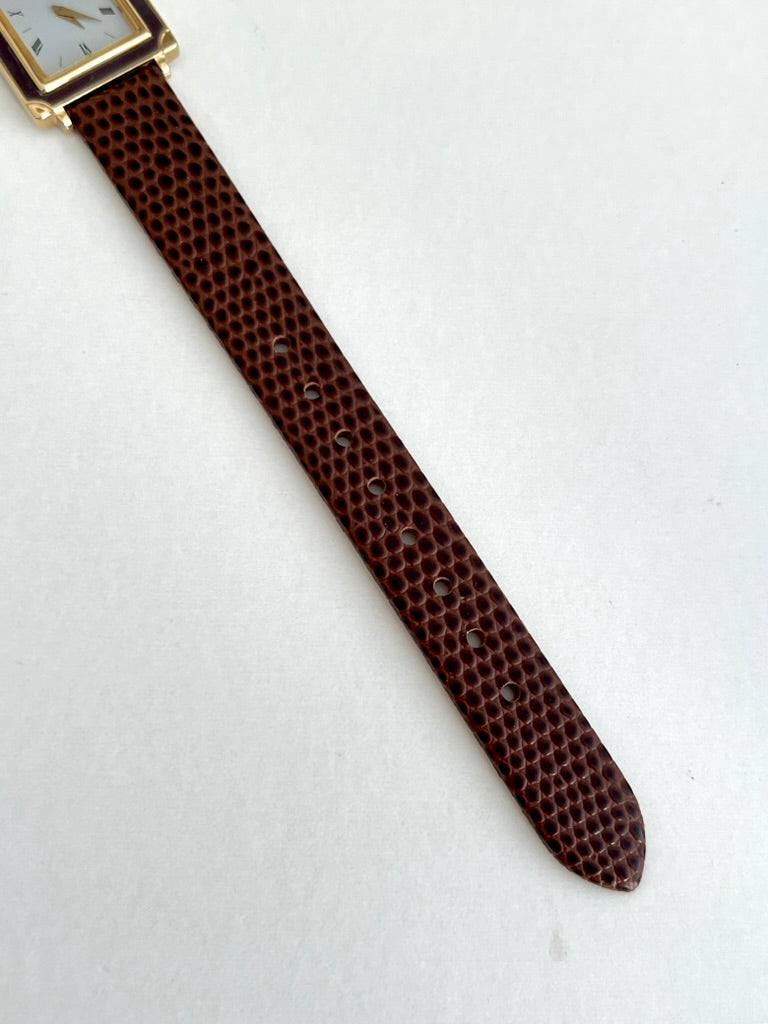 Seiko Brown Frame Roman Dial Leather Strap Watch: brown strap tip.