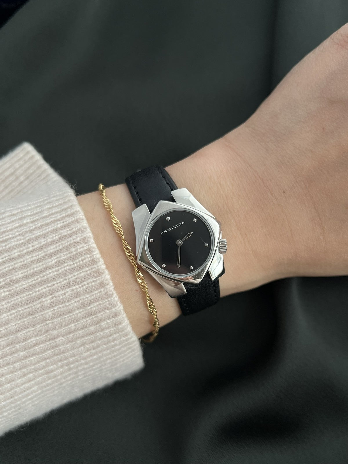 Hamilton Stardom 6357 black dial watch shown worn on the wrist with a black leather strap