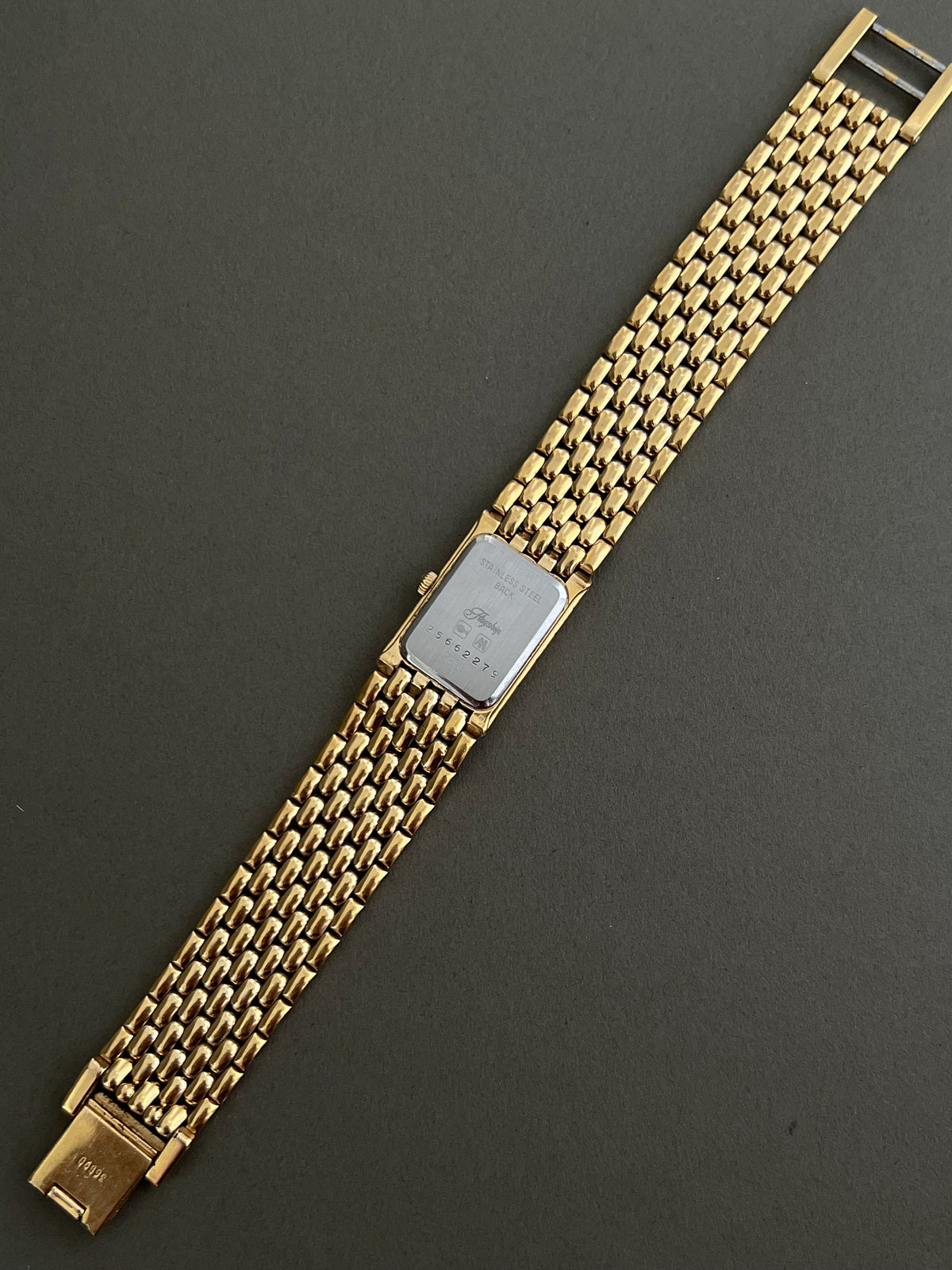 Longines Flagship Gold Tank Bracelet watch — flagship caseback close up