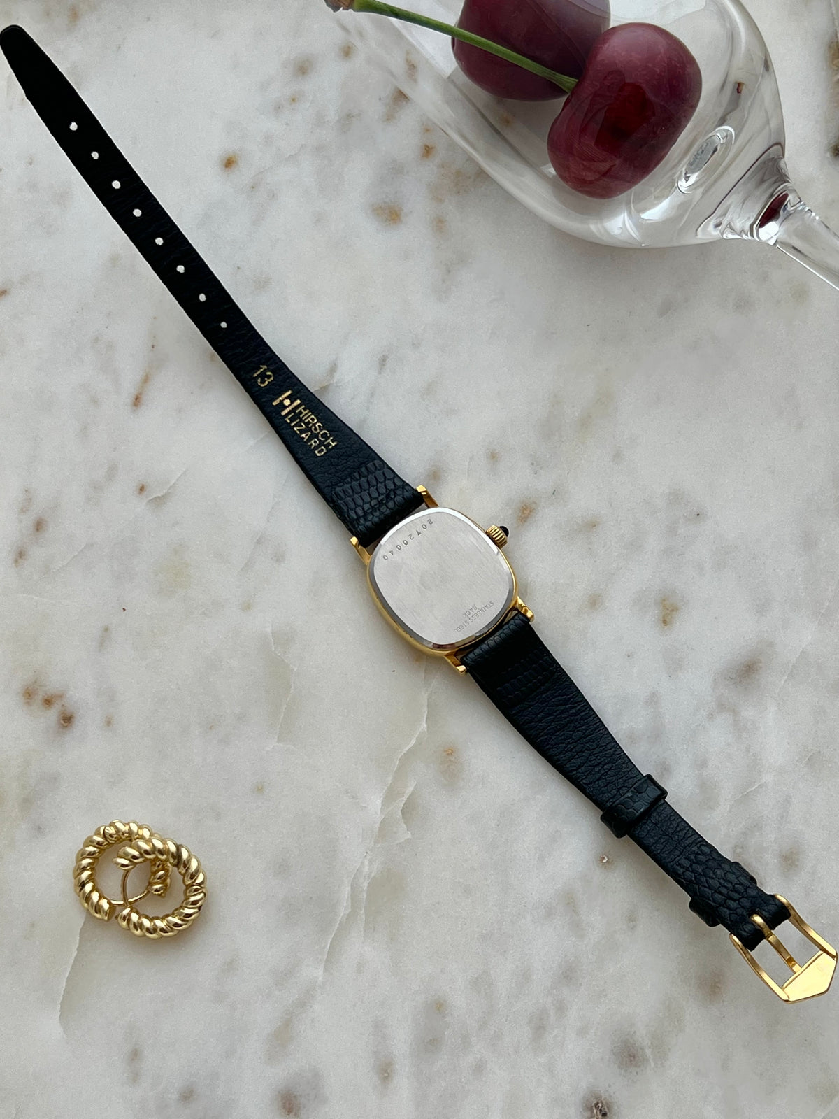 Longines Oblong Patterned Dial Women’s Watch — Rear view of the caseback and black strap