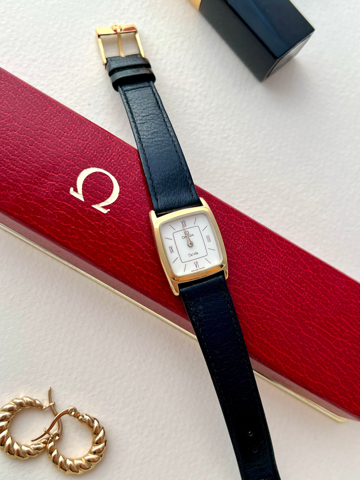 Front view of the Omega De Ville soft rectangular watch.