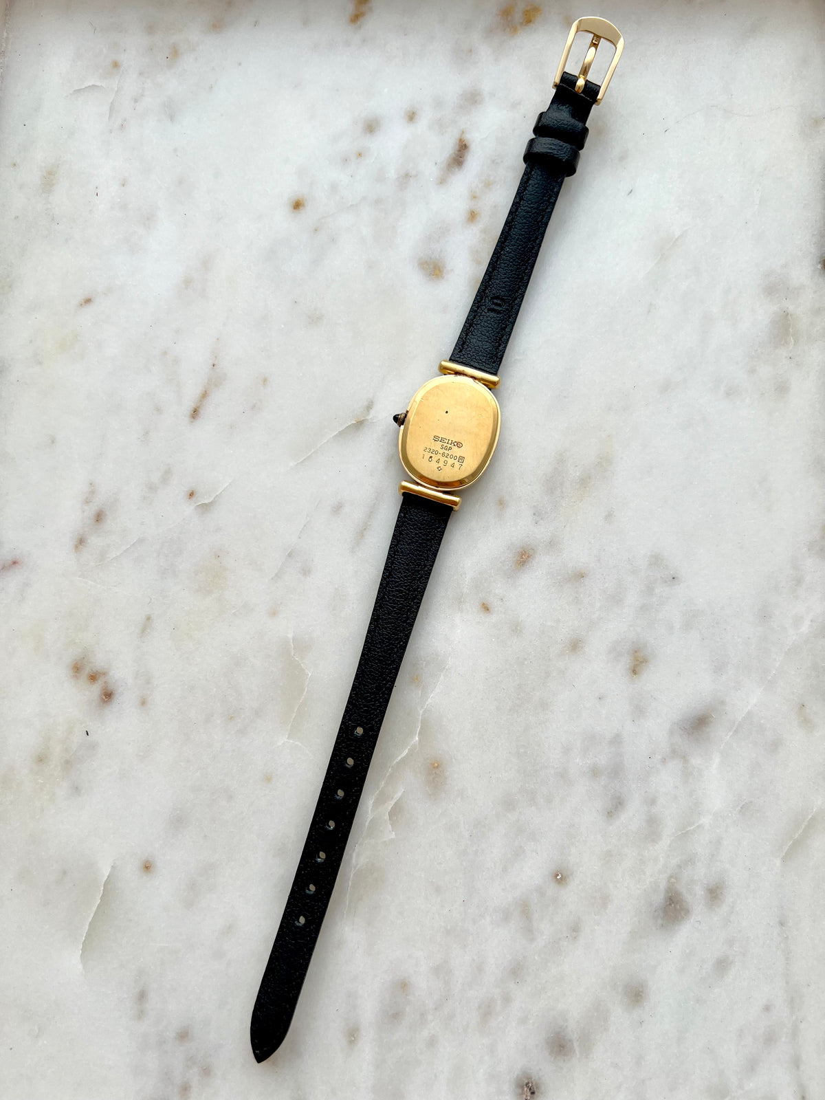 Seiko Exceline One Diamond Gold Dial Leather watch 2320-6200: caseback and reverse of the strap or bracelet.
