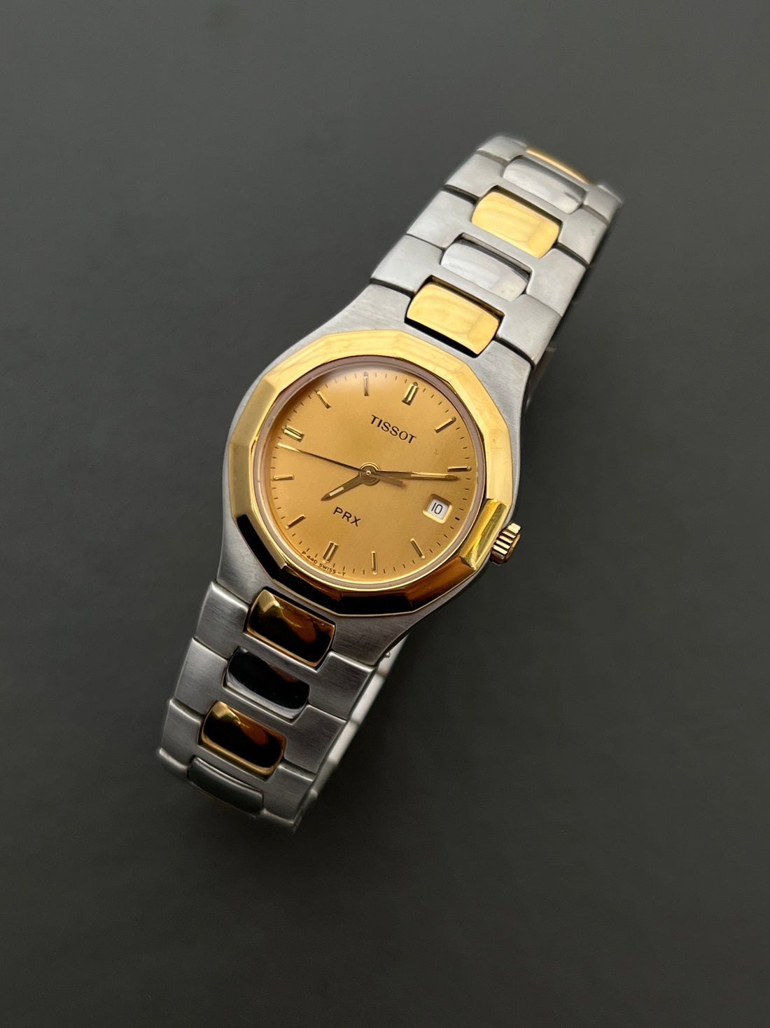 Vintage gold watch styled for The Gilded Hour editorial