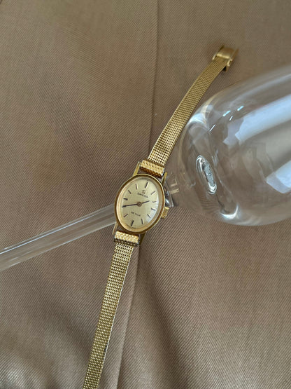 Omega De Ville Oval Champagne Dial Cocktail Women’s Watch