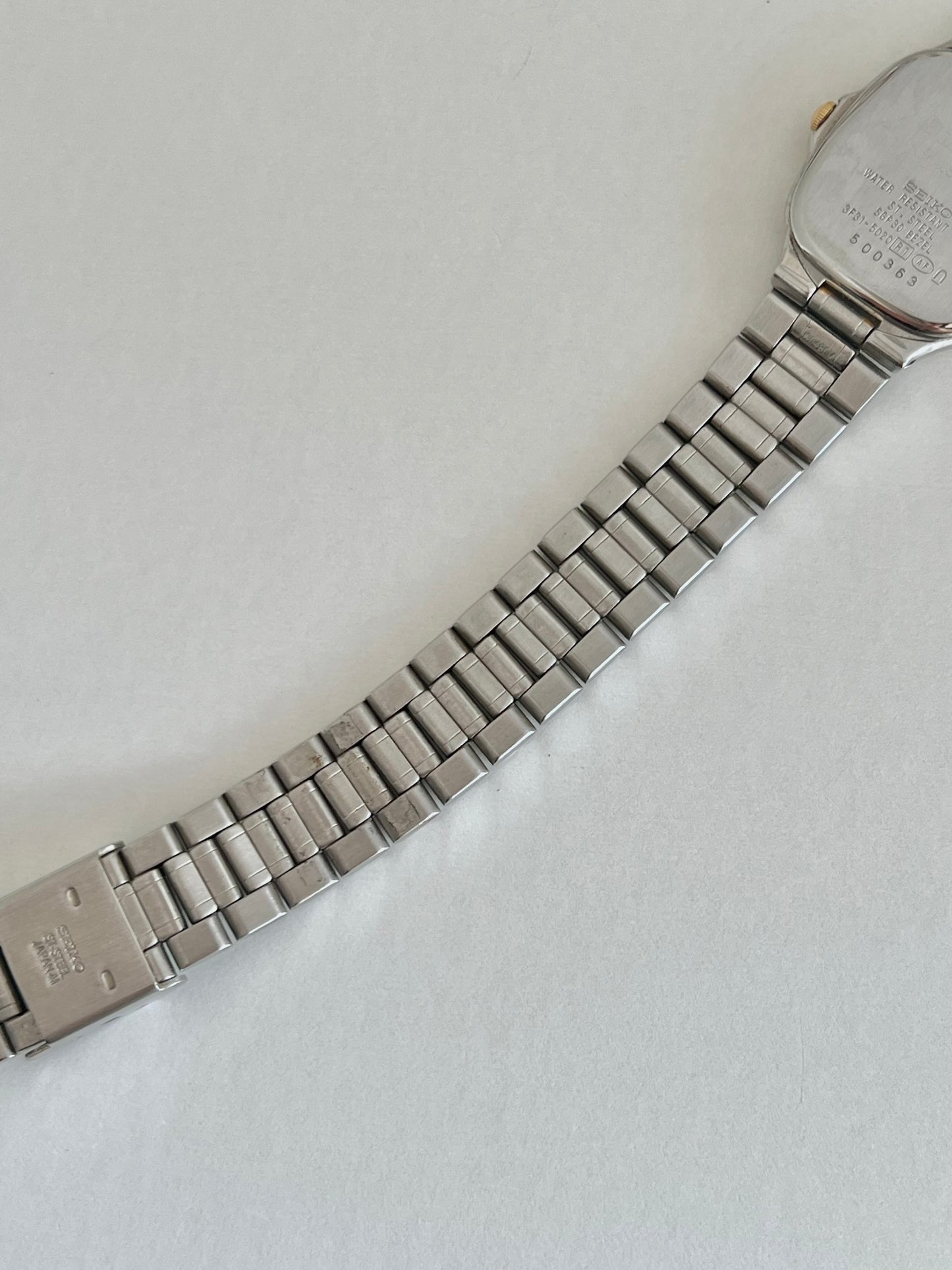Seiko Soft Rectangular Two Toned Woman's Watch with Linen Textured Dial