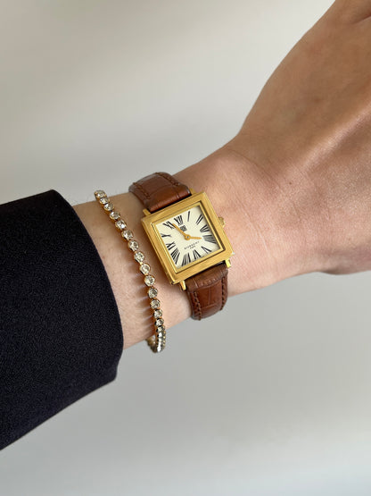 Givenchy Essence Cream Roman Dial Gold Frame Women’s Watch